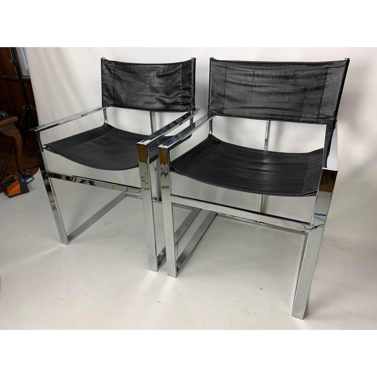 Vintage mid-century chrome & leather flat bar director style arm chairs - a pair.
