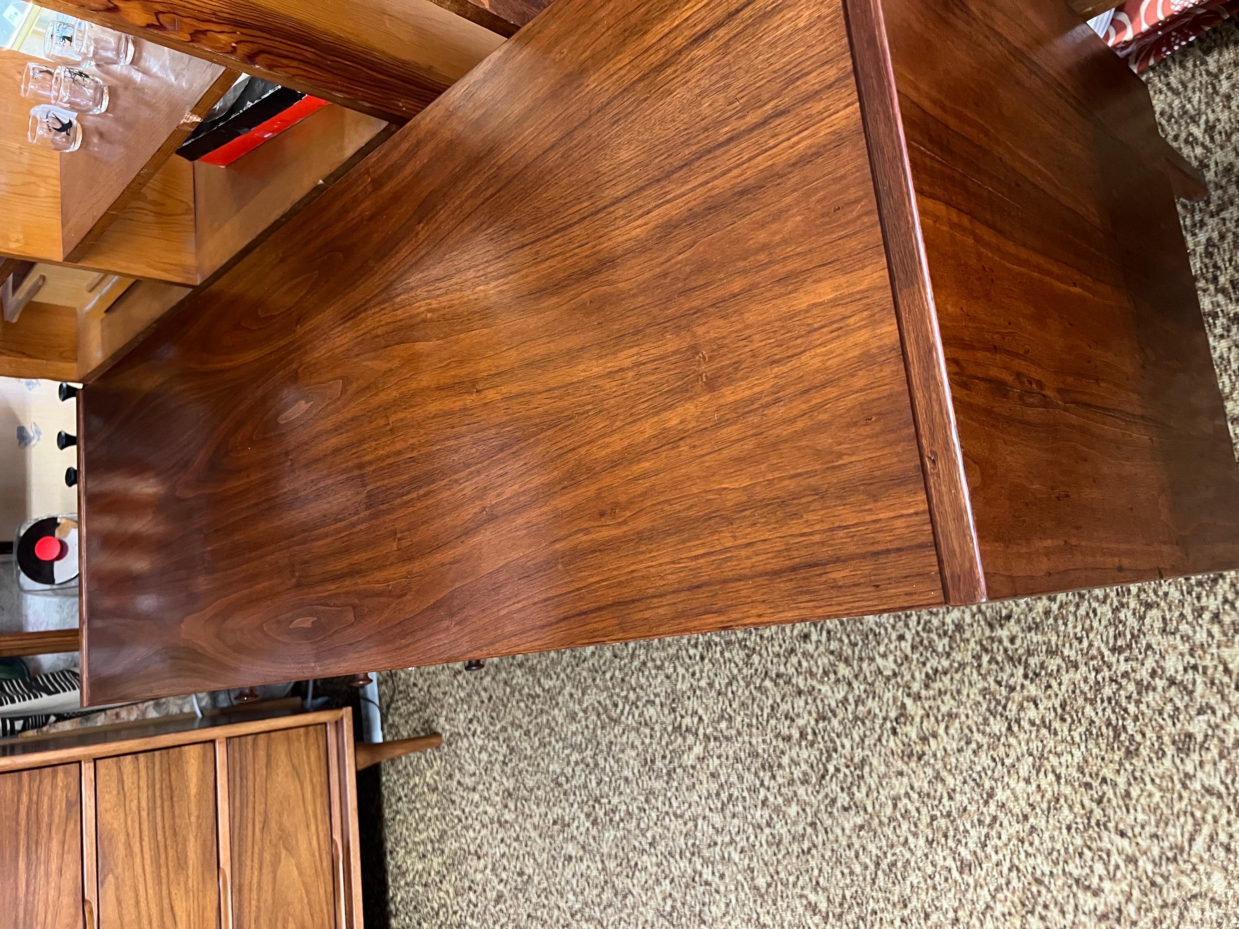 Vintage mid century credenza or buffet with caning and dovetailed drawers. Designed by Jack Cartwright for Founders.