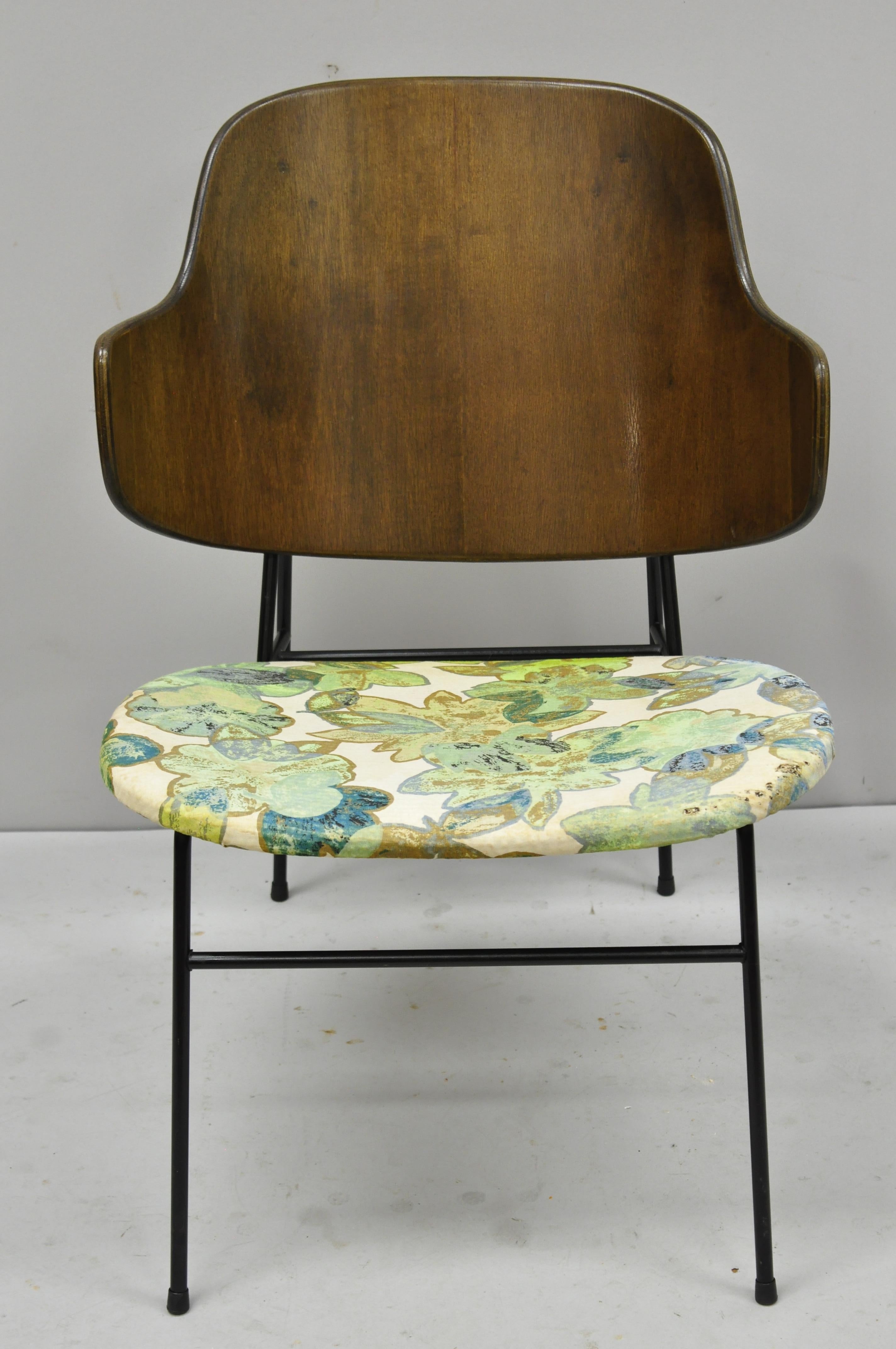 Vintage midcentury Danish modern Ib Kofod Larsen Selig Penguin chair. Item features bent wood back, wrought iron frame, original stamp, clean modernist lines, sleek sculptural form, circa mid-20th century. Measurements: 29