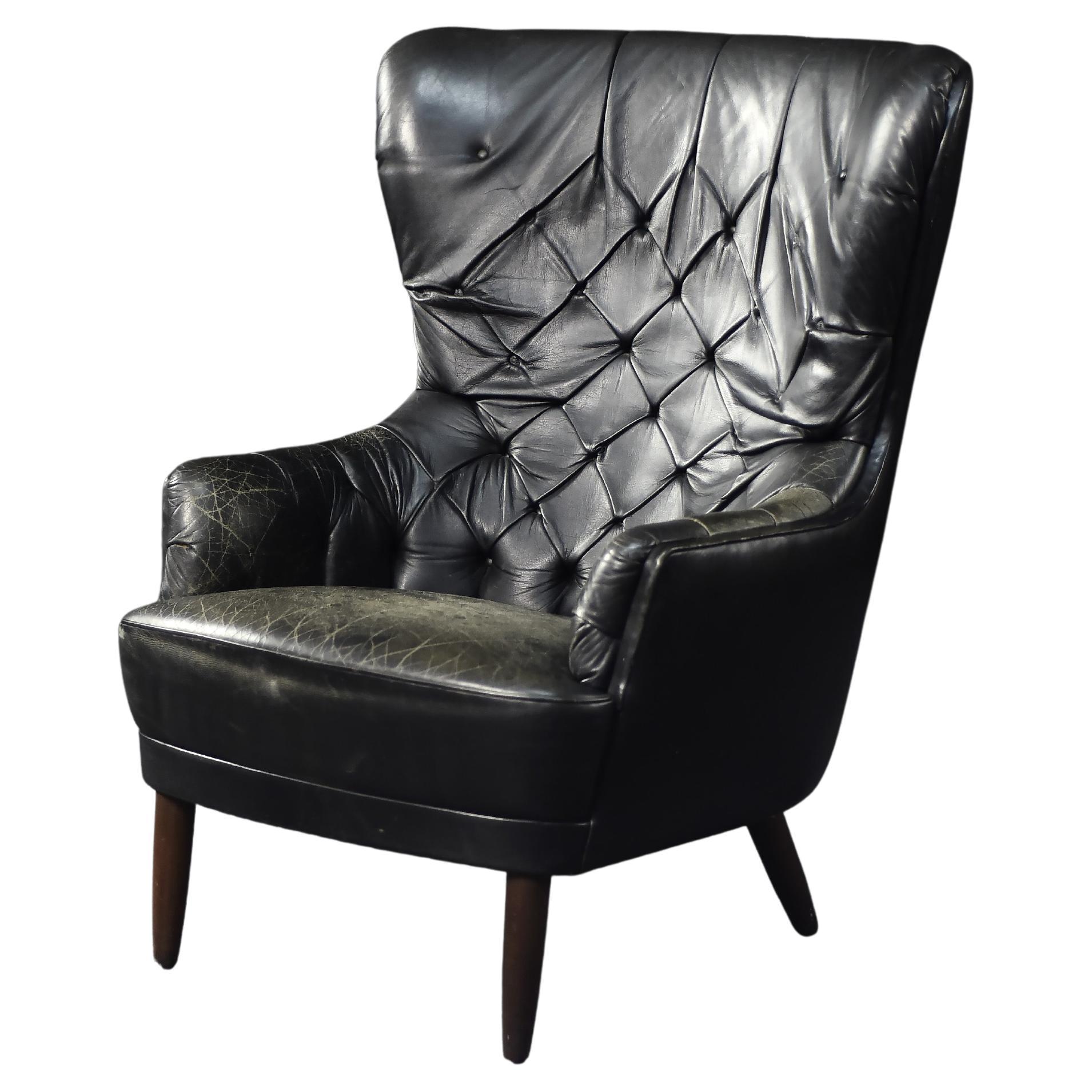 Vintage Mid-Century Danish Modern Gesteppter schwarzer Leder Ohrensessel, 1960er Jahre im Angebot