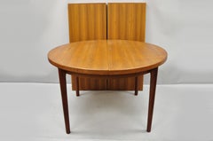 Mid-Century Danish Modern Round Teak Extension Dining Table with 2 Leaves
