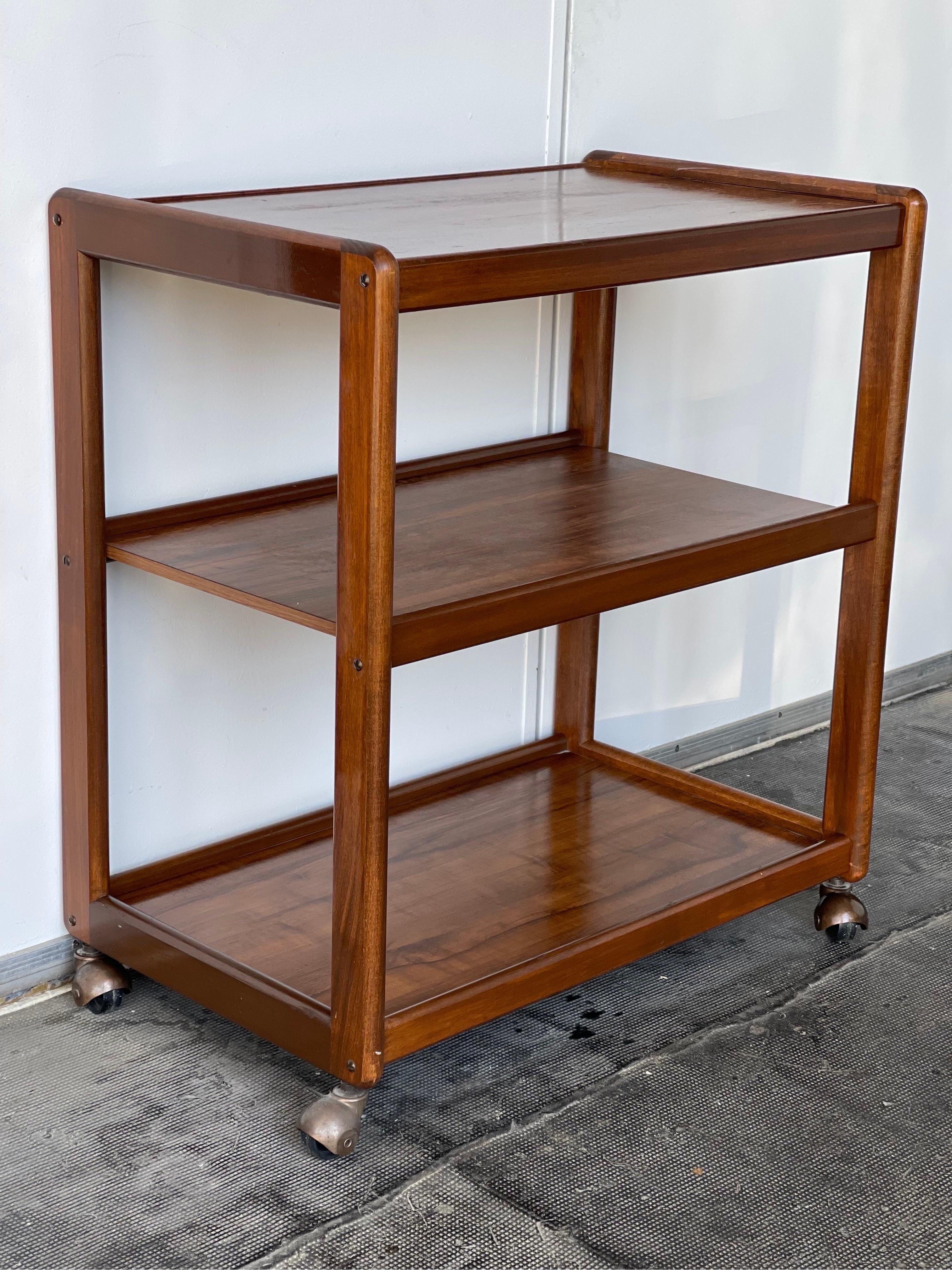 Vintage midcentury Danish Modern Teak Bar Cart with Casters

Dimensions. 29 W ; 18 D ; 31 1/2 H.