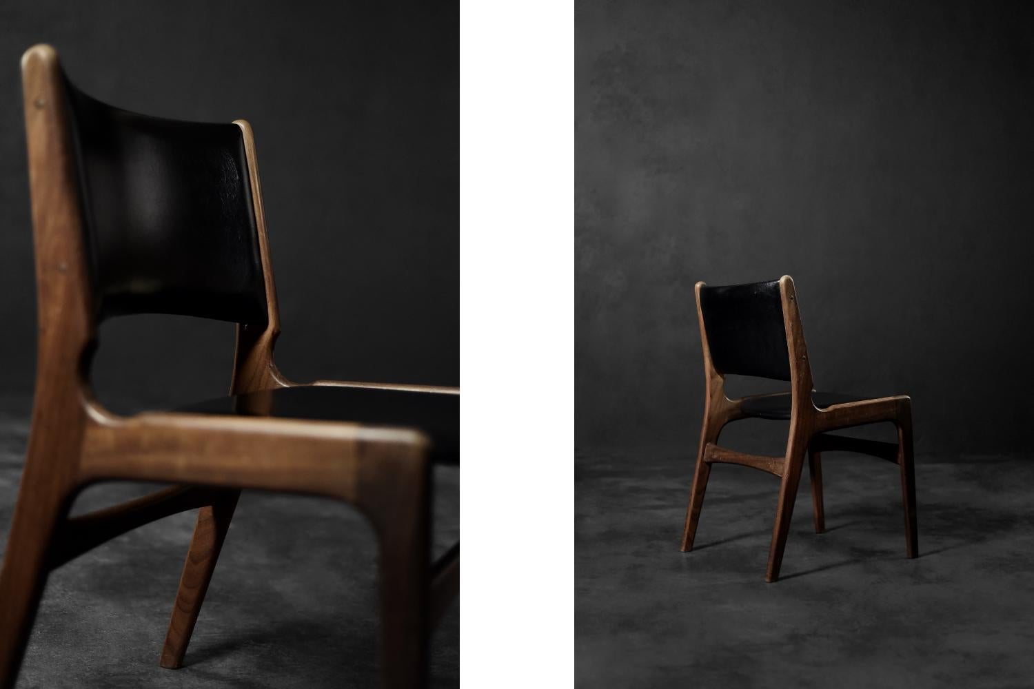Cette chaise moderniste a été conçue par Erik Buch pour le fabricant danois Anderstrup Møbelfabrik dans les années 1950. Il s'agit du modèle 89. Fabriqué en bois de teck de haute qualité dans une teinte brune foncée. L'assise et le dossier,