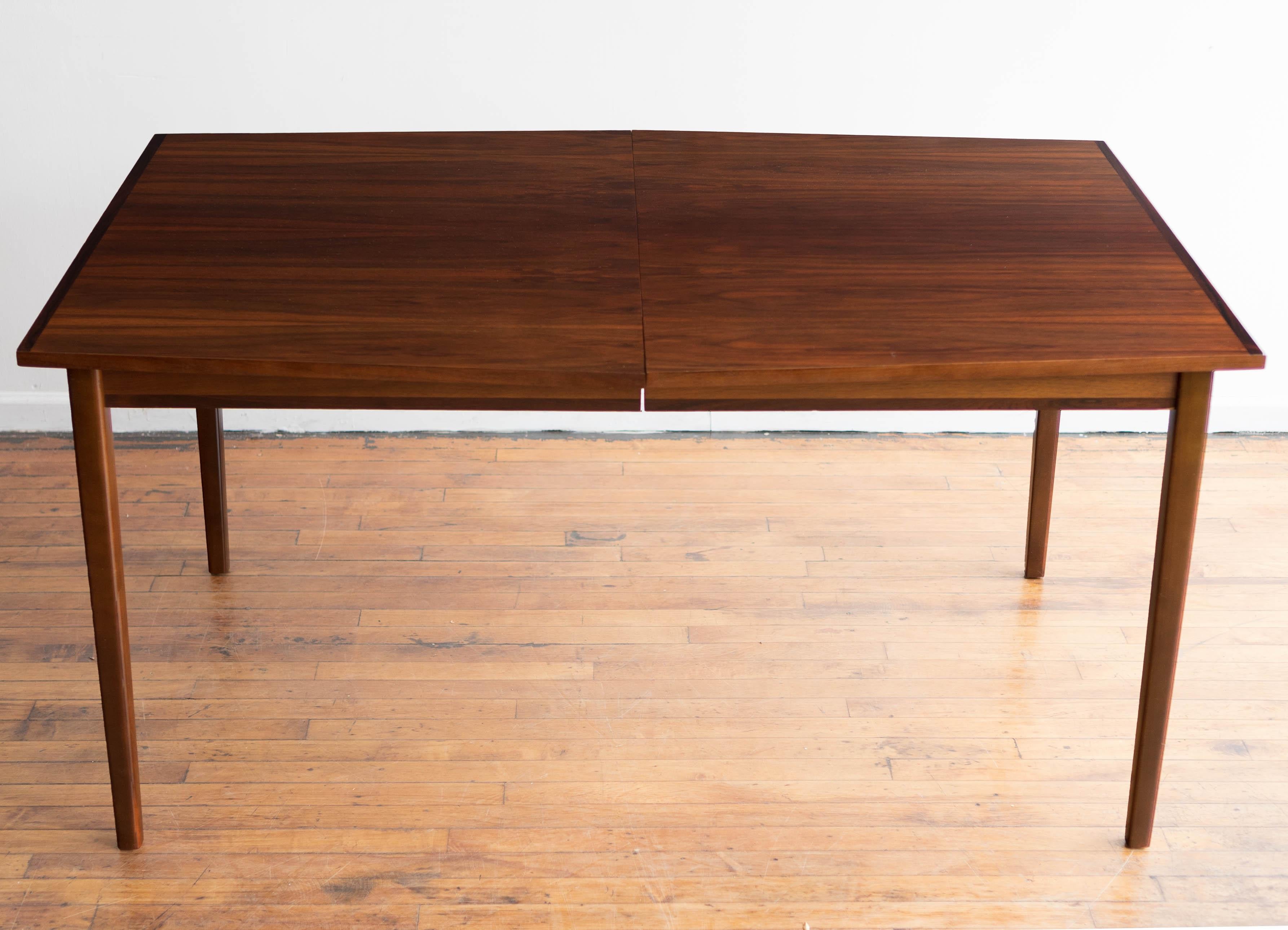 60.5” x 40” x 30.5”H, 26.25” table clearance

Gorgeous surfboard-style Danish rosewood dining table with unique horizontal grain. Tapered legs that can be removed for transport. Fits 4-6 depending on chair style. 

Overall excellent condition with a