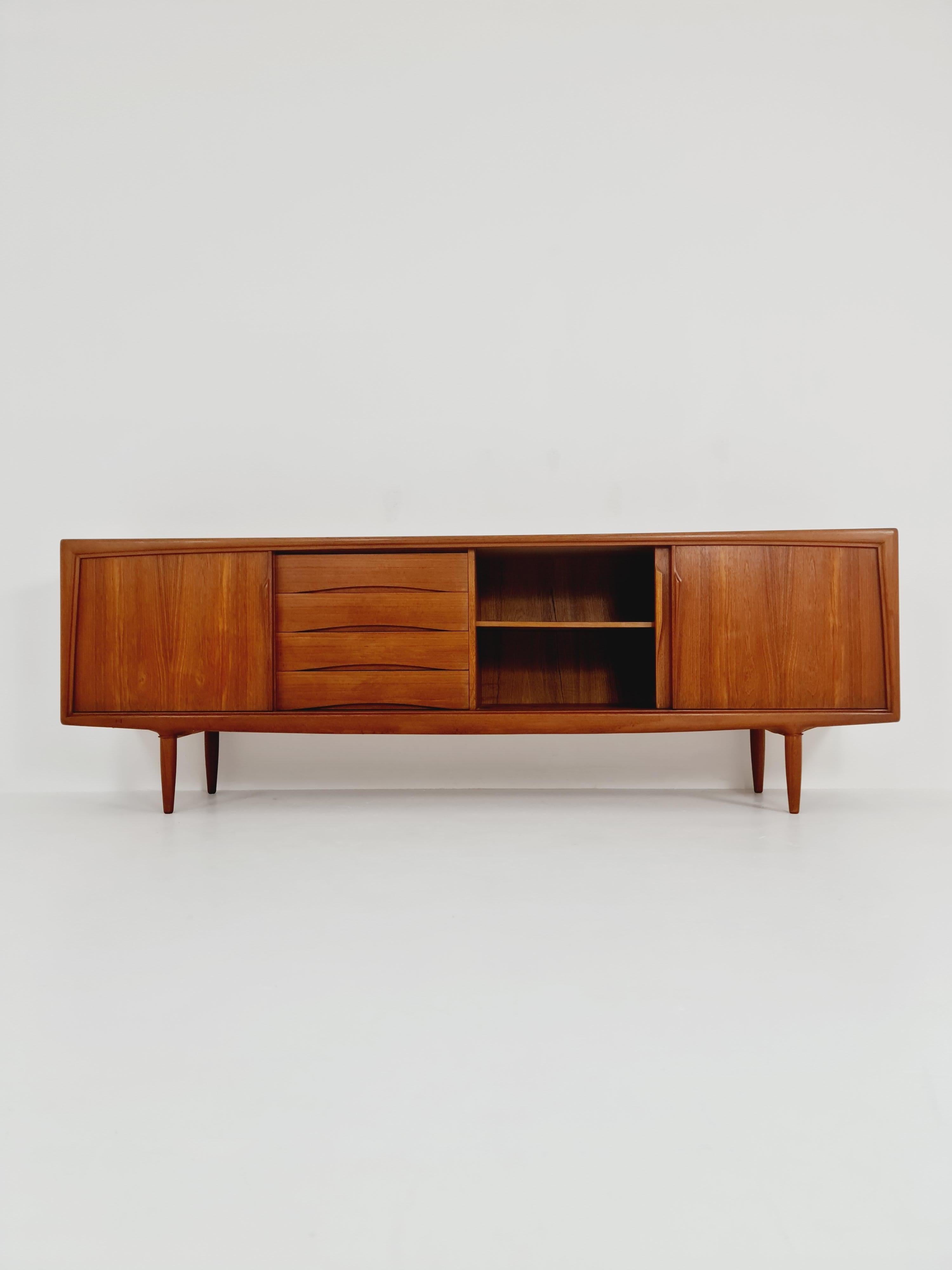 Vintage Mid century Danish Sideboard by Axel Christensen for ACO Møbler, Denmark, 1960s

Dimensions: 
46 D x 250 W x 80 H cm

It is in good vintage condition, however, as with all vintage items some minor wear marks should be expected.

Please