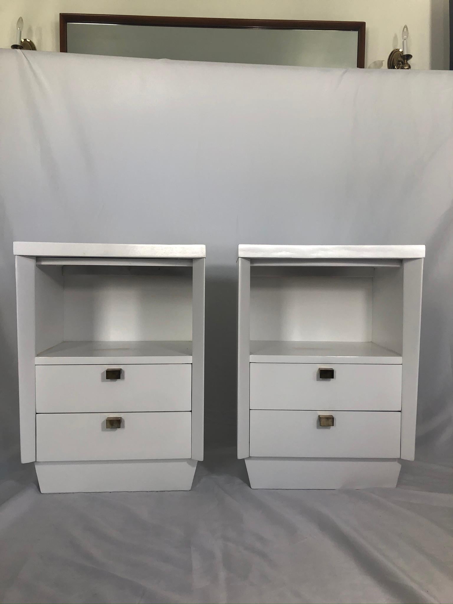 Beautiful streamline nightstands. 2 drawers and cubby for ample storage. Great forward moving lines. Brass drawer pulls. Newly lacquered finish with popping white.
Curbside to NYC/Philly $350