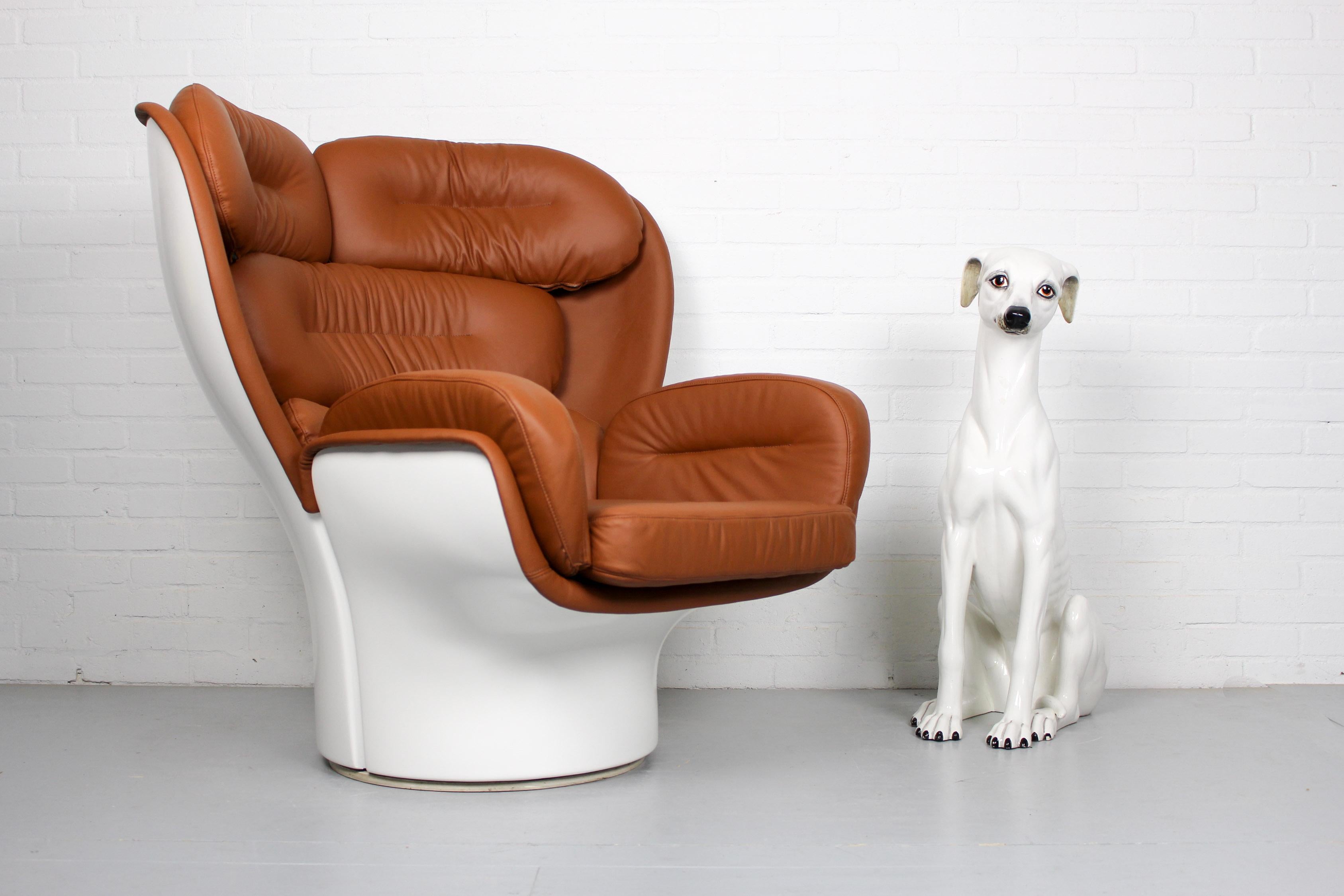 This armchair in new brown leather (ElmoSoft) was designed by Joe Colombo and was produced by Comfort in 1960s. It is newly upholstered and professionally lacquered and is therefor in perfect condition.