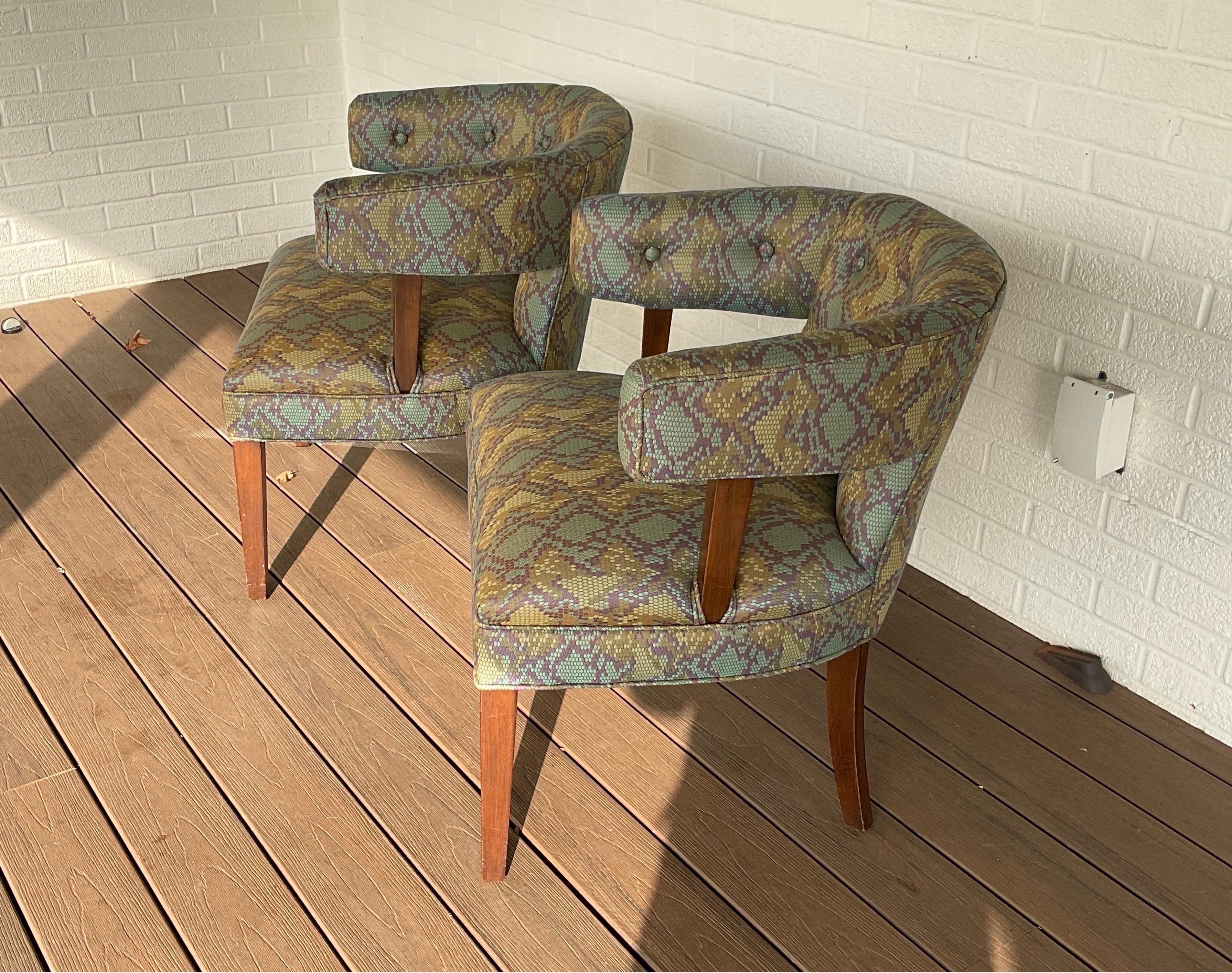 Fresh from a complete renovation and wrapped in the most decadent Lee Jofa snakeskin pattern upholstery fabric. Aqua, violet, copper and green come together in spectacular fashion on these Uber cool vintage side chairs.