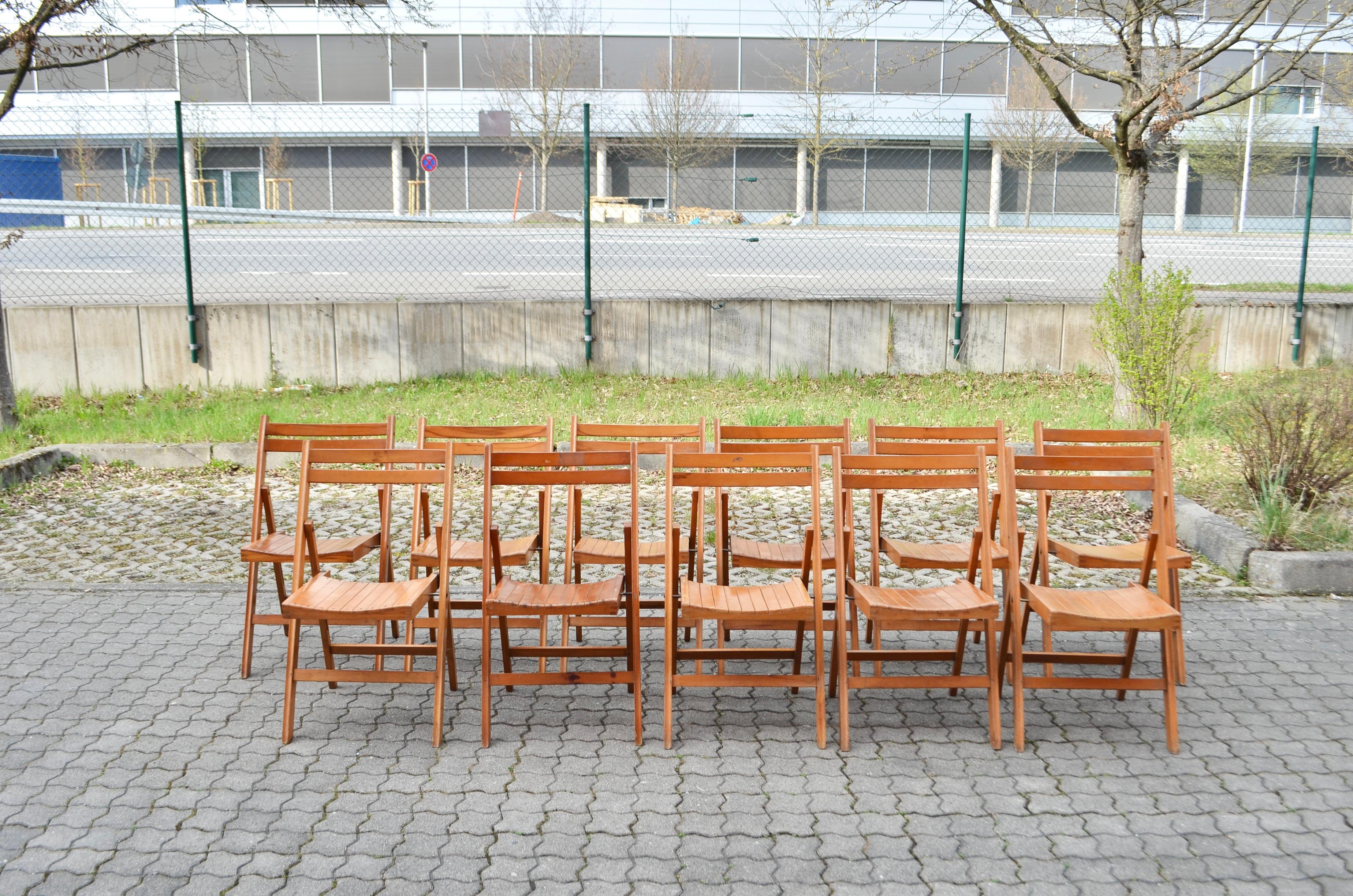 This Mid Century folding chair was manufactured back in the old days 70ties in Yugoslavia.
It is made of solid beech wood. It has a beautiful honey colour.
Some wear and Patina. Comefortable seating.
It is stackable.

Price for 1 chair.
We have 11