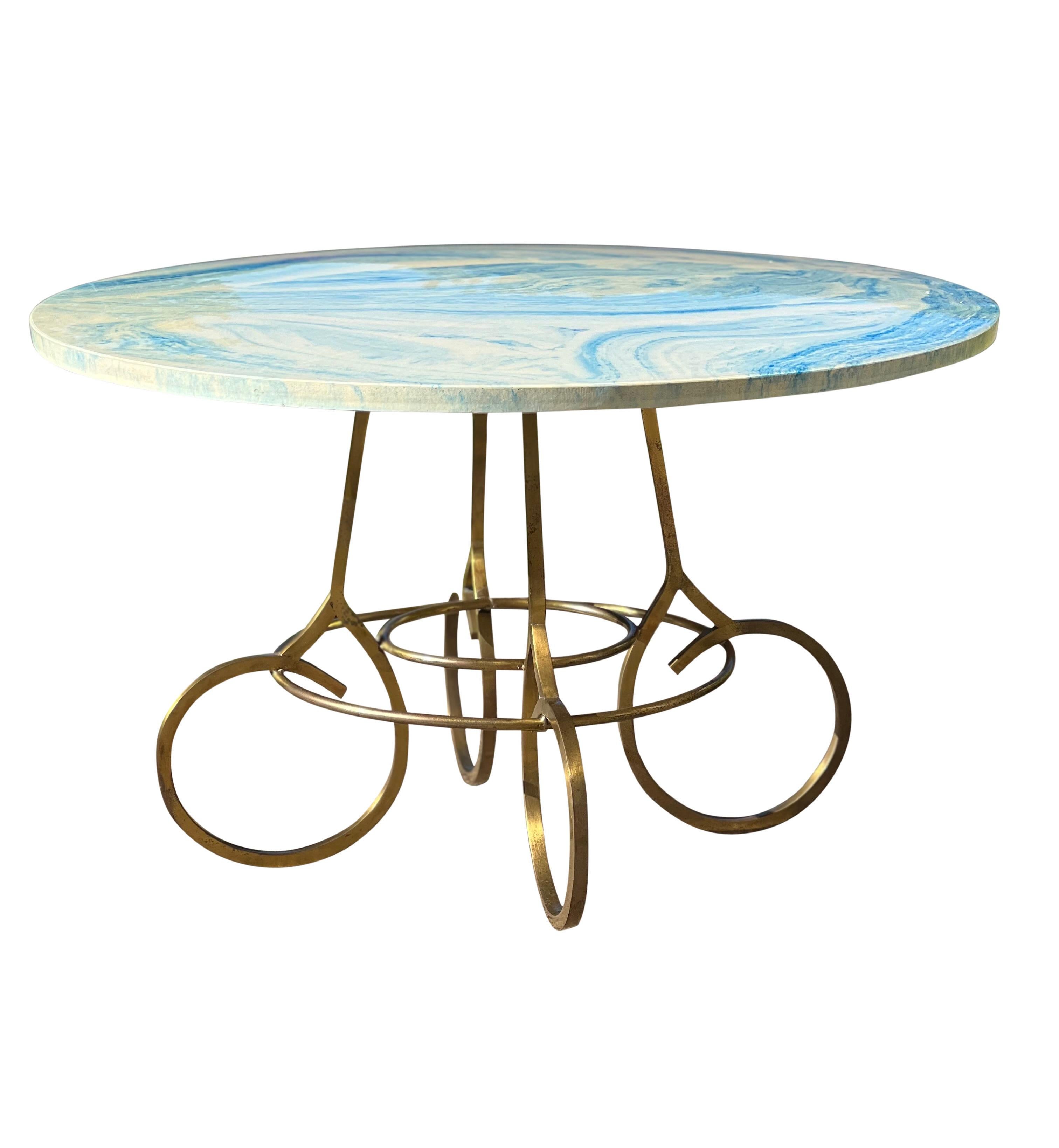 Beautiful French garden small coffee table, 1960's. 

The top is crafted of composite stone with a marbled coating in calming shades of turquoise and cream on an elegant brass base. Fabulous anywhere, this is an exceptional table.