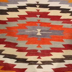 Tapis Kilim vintage en laine bleue du milieu du siècle dernier avec accents multicolores par Rug & Kilim