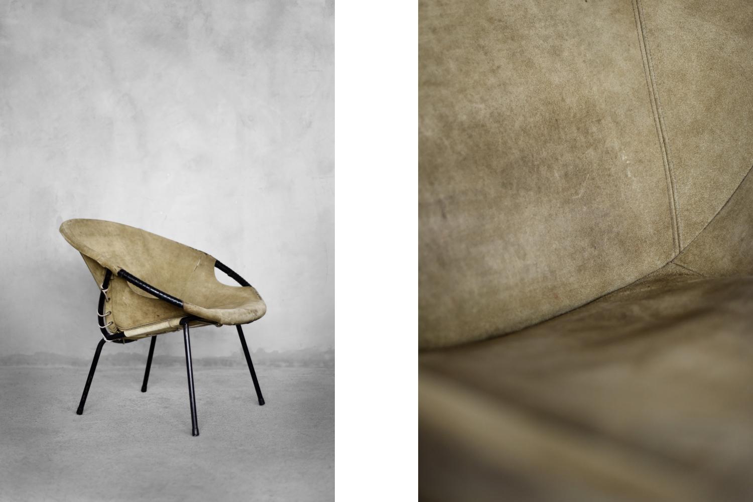 La Balloon Chair originale è stata prodotta dal produttore tedesco Lusch & Co negli anni Sessanta. Il disegno è attribuito a Lusch Erzeugnis. La struttura è in metallo, mentre il rivestimento è in pelle naturale (scamosciata) di colore verde terra.