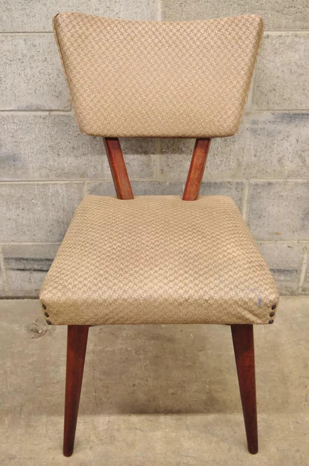 Please message us with your zip code to request a more reasonable domestic U.S shipping quote.

Vintage Mid Century Gilbert Rohde/Jens Risom Style Mahogany Dining Side Chair (C). Item features a solid wood frame, beautiful wood grain, tapered legs,