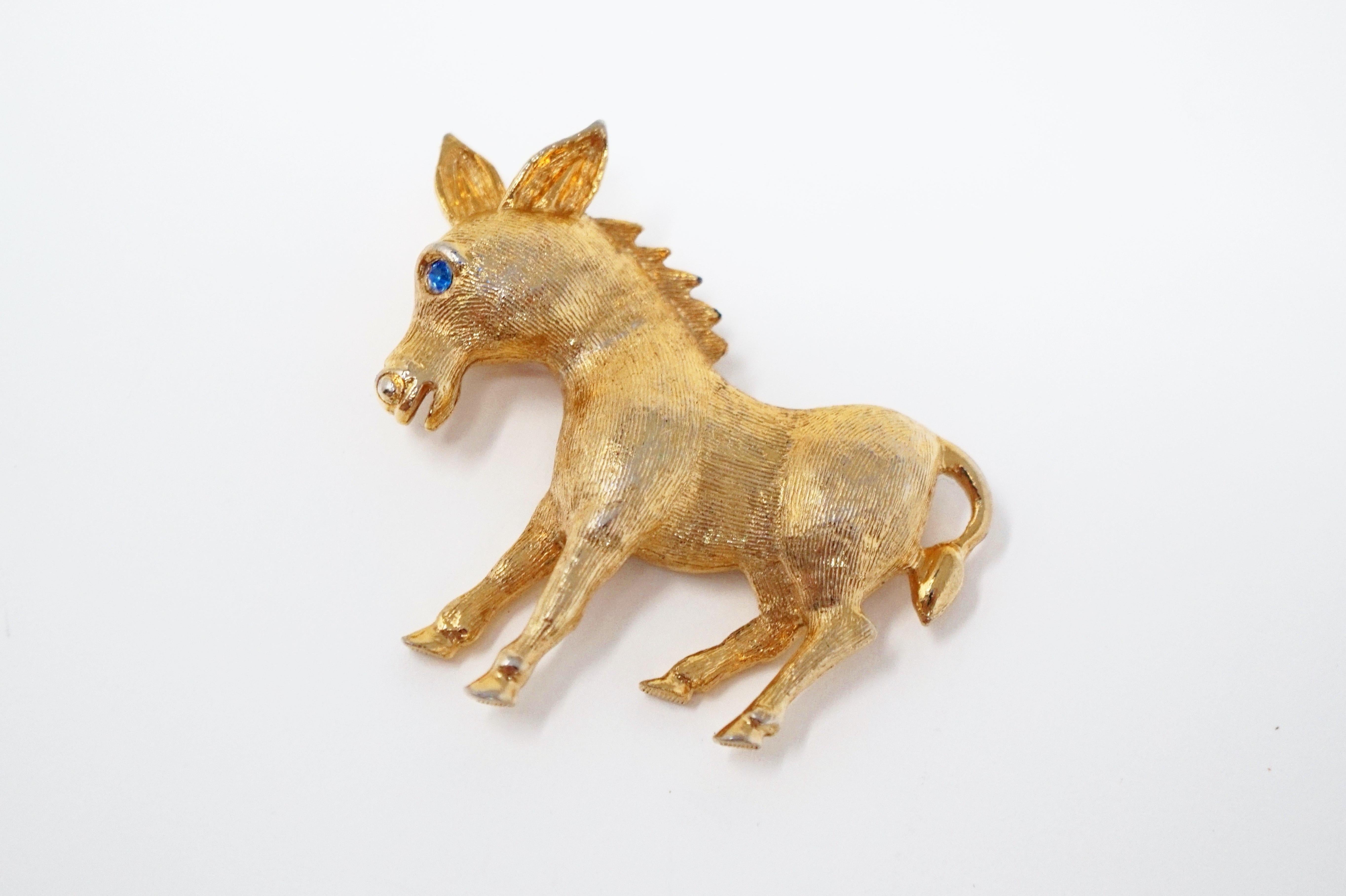 Modern Vintage Mid-Century Gilded Pony Brooch with Blue Crystal Eye For Sale