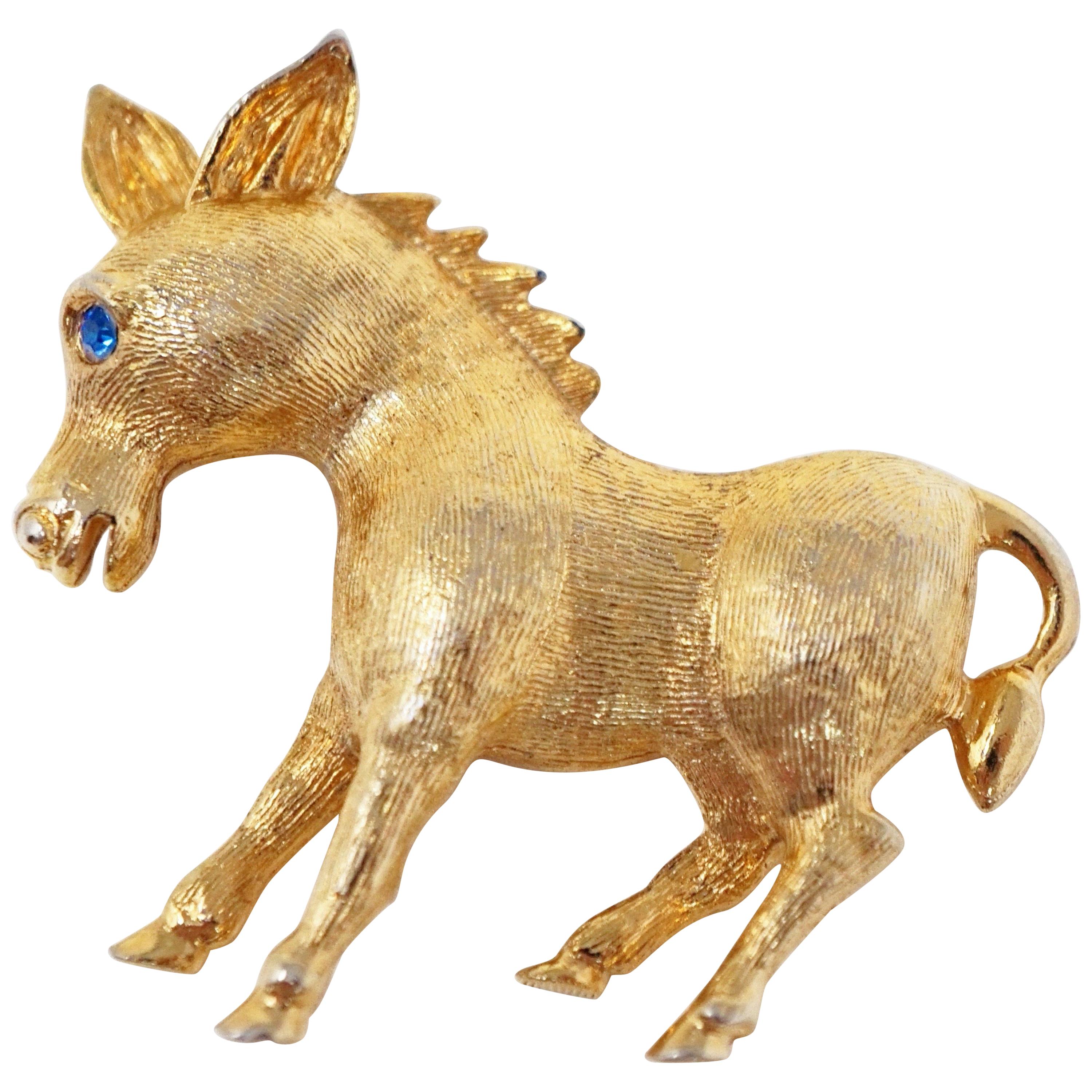 Vintage Mid-Century Gilded Pony Brooch with Blue Crystal Eye For Sale