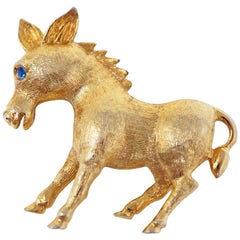 Vintage Mid-Century Gilded Pony Brooch with Blue Crystal Eye