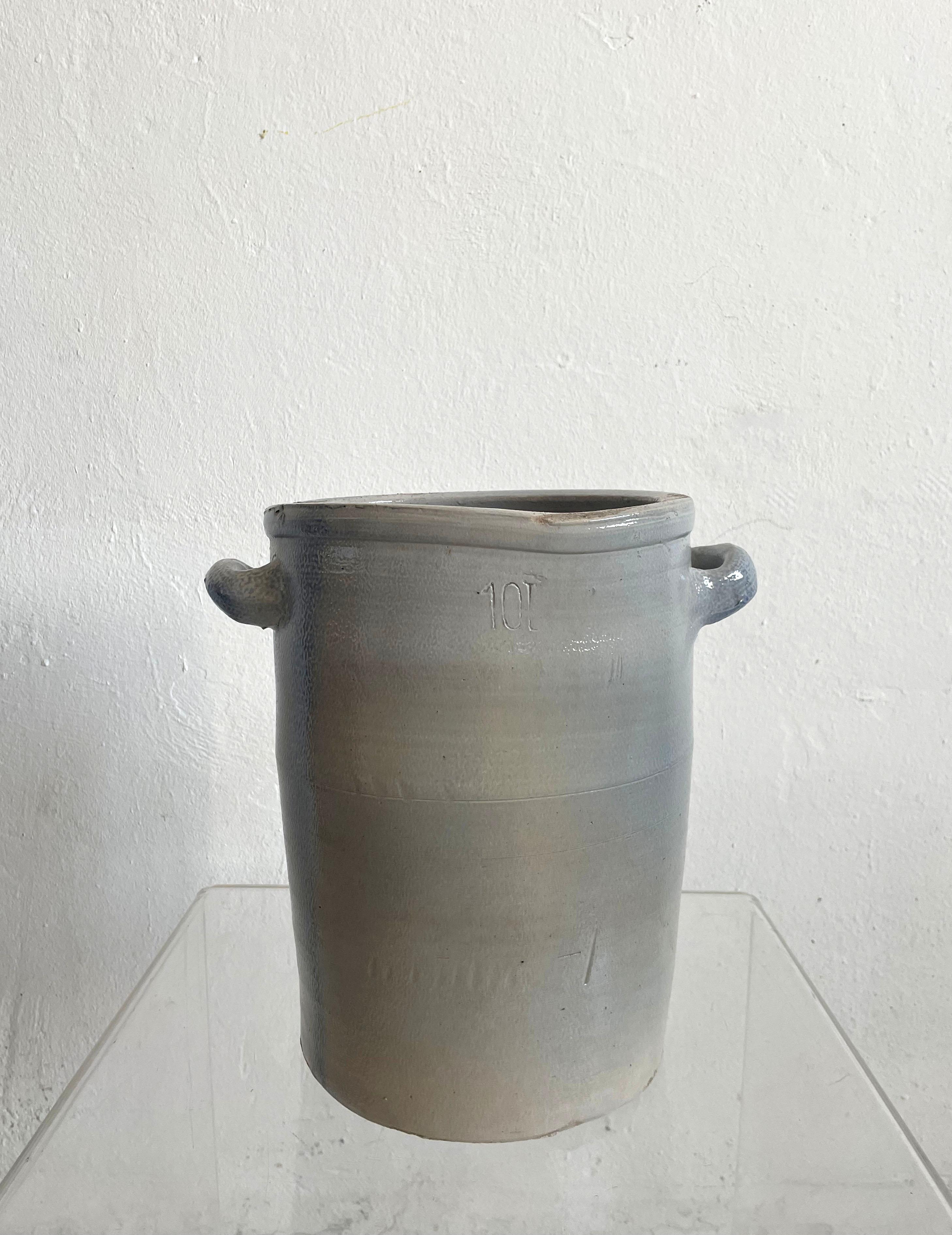 Stunning large and heavy vintage Mid-century stoneware jug with handles

Beautiful greyish-blue glaze

marked '10L'

Unknown manufacturer

weights 4.80 kg

The item remains in a very good original condition with minimal traces of cosmetic