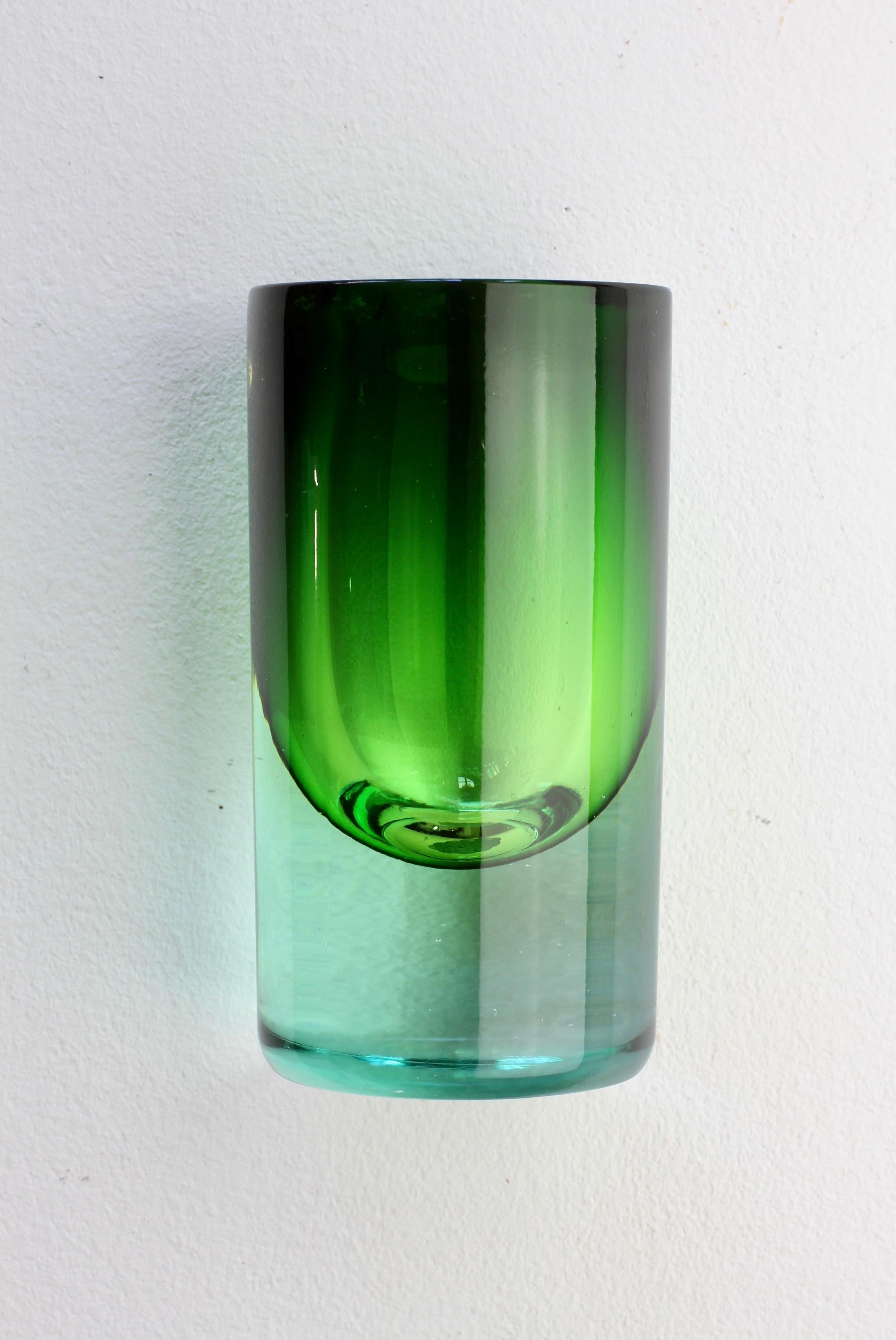 Vintage midcentury Italian Murano glass vase, circa 1965-1975. Made using the Sommerso (submerged) glass technique with a light blue / clear layer over emerald green colored glass. 

The maker is, as yet, unidentified but the style is similar to