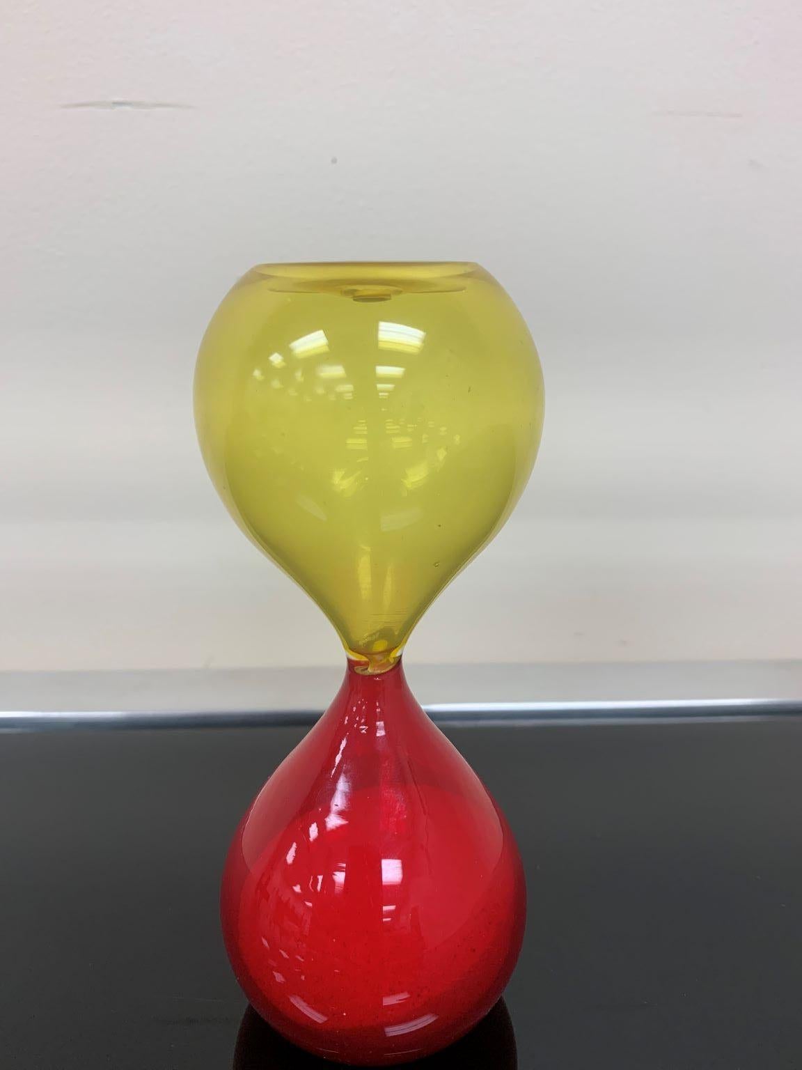 Beautiful vintage Glass (“Clessidre” Italian) hourglass timer in red and yellow, designed by Paolo Venini. Excellent original condition. Model 4905 and shown in the catalogue, 