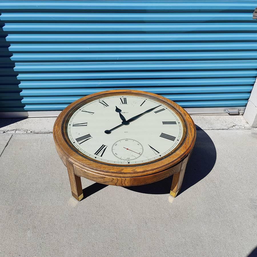 Now available is an amazing Howard Miller clock coffee table c1970s. Measures approximately 41 inches in diameter x 16.5t. Needs batteries. 


 