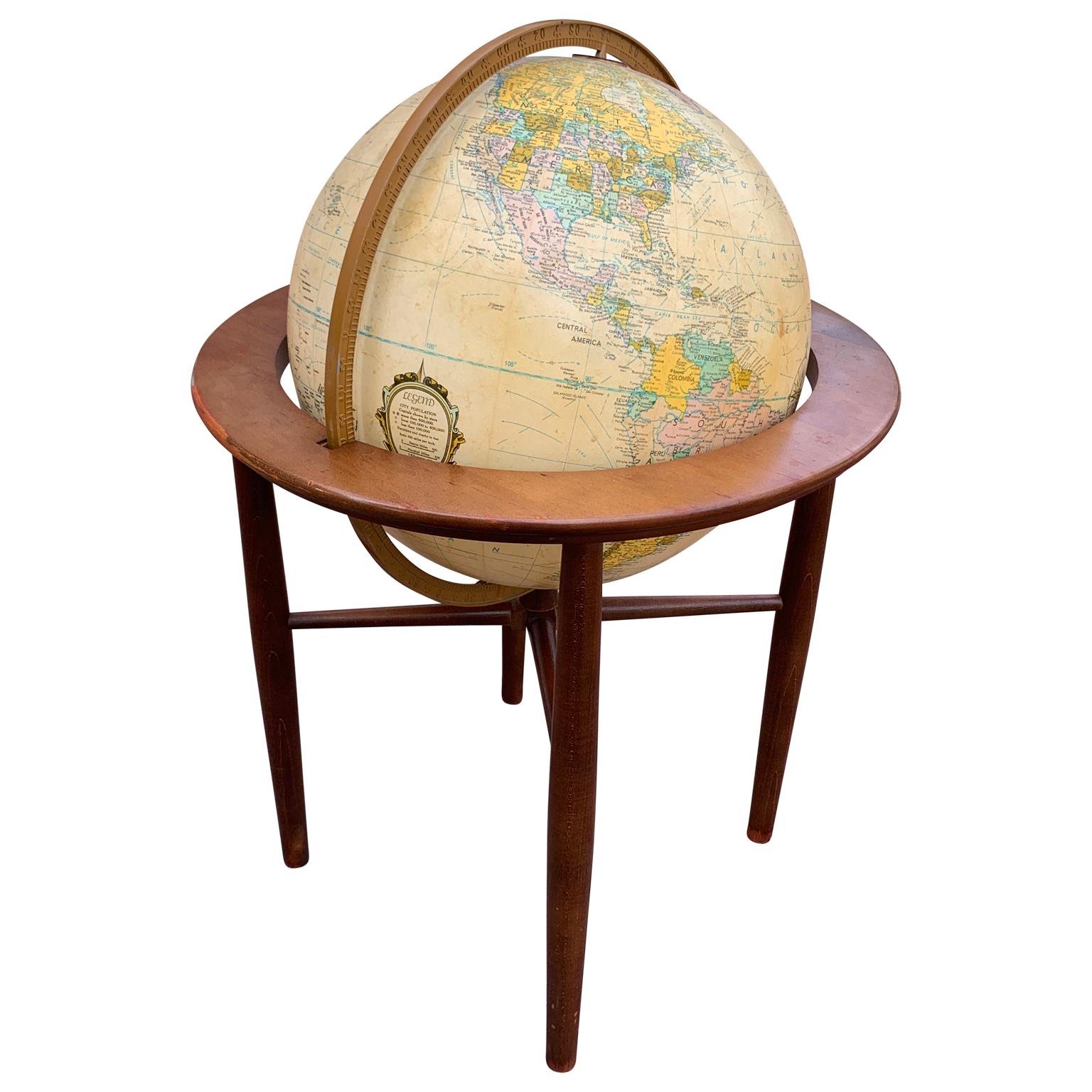 Vintage midcentury illuminated floor globe by Replogle Globes Inc.
The globe is made in the USA and Leroy M. Tolman was the cartographer.