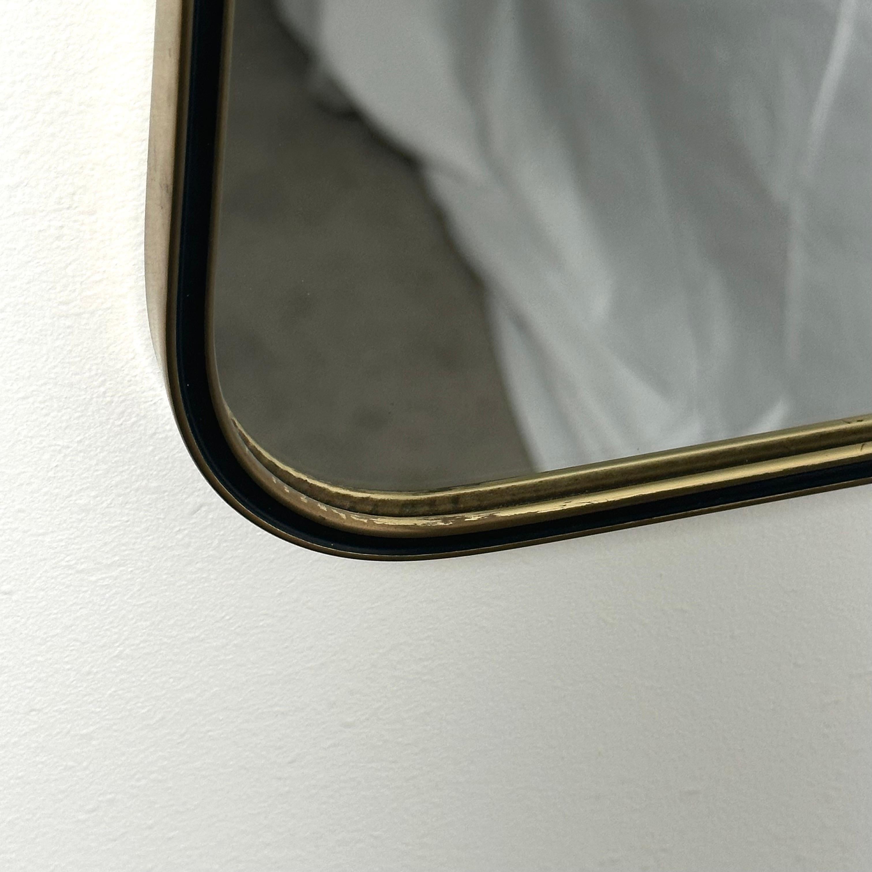 Vintage Mid Century Italian Brass Hourglass Wall Mirror with Black Curve Detail In Good Condition In Amityville, NY