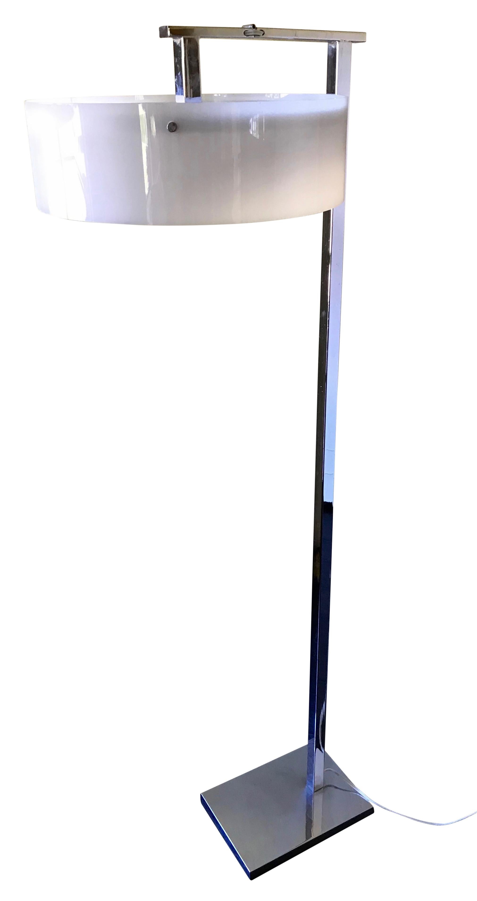Kurt Versen style flip top convertible chrome floor lamp with original white acrylic shade.
Arm hinge flips up for a torchiere lamp and down for a reading lamp.
The switch is on a foot petal connected to the cord.
1960's-1970's mid-century
Recently
