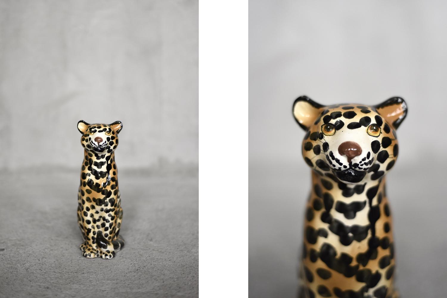 This large leopard figure, probably was made in Italy during the 1970s. The figure is made of high-quality hand-painted ceramic in intense shades of orange, densely speckled with black spots. The leopard is ideal as a decoration for a study or