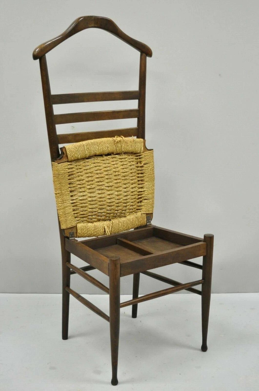 Vintage Mid Century Italian Modern Wood & Rope Clothing Valet Butlers Chair. Item features a woven rope seat, lift up storage lid, hanger form top rail for jackets, solid wood frame, beautiful wood grain, tapered legs, sleek sculptural form. Circa