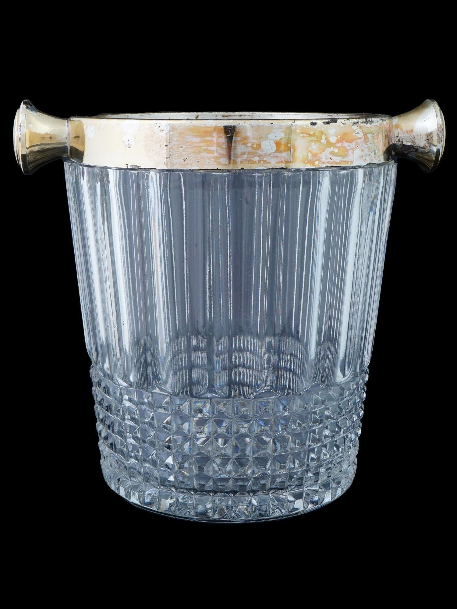 Fine vintage leaded glass ice bucket or wine cooler with ribbed design and silverplate mounts.