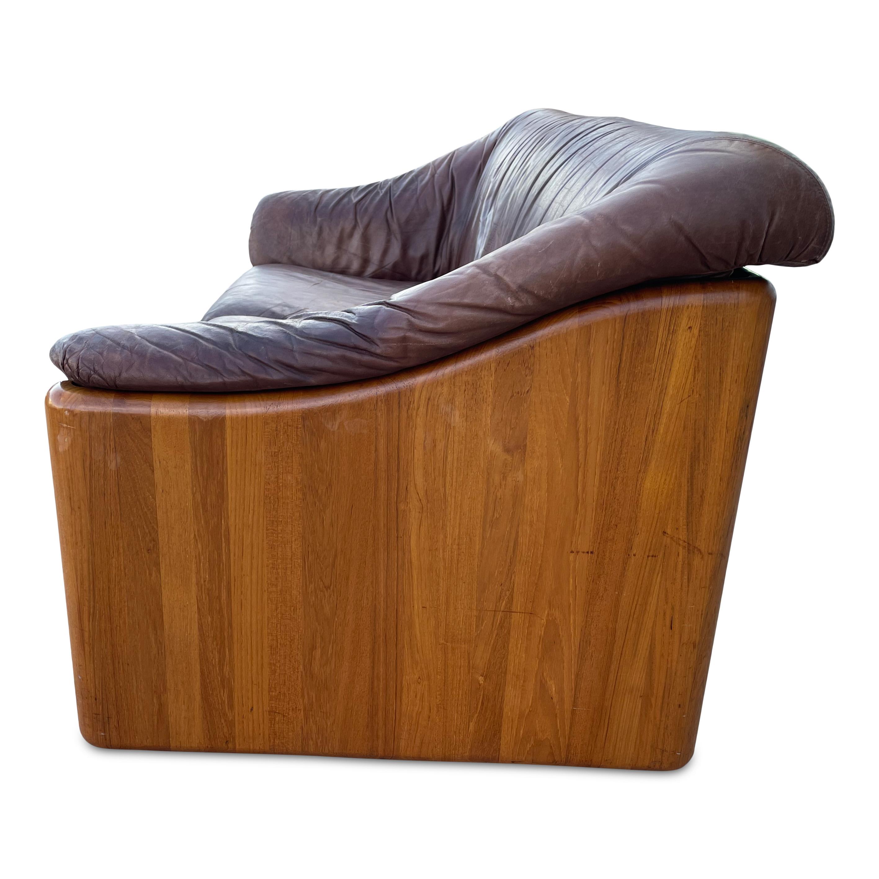 Classically Mid Century, perfect for a Frank-Lloyd Wright inspired home or as a warm vintage accent in a neutral space. Comfortable, warm and beautifully aged. 

Measures: 65