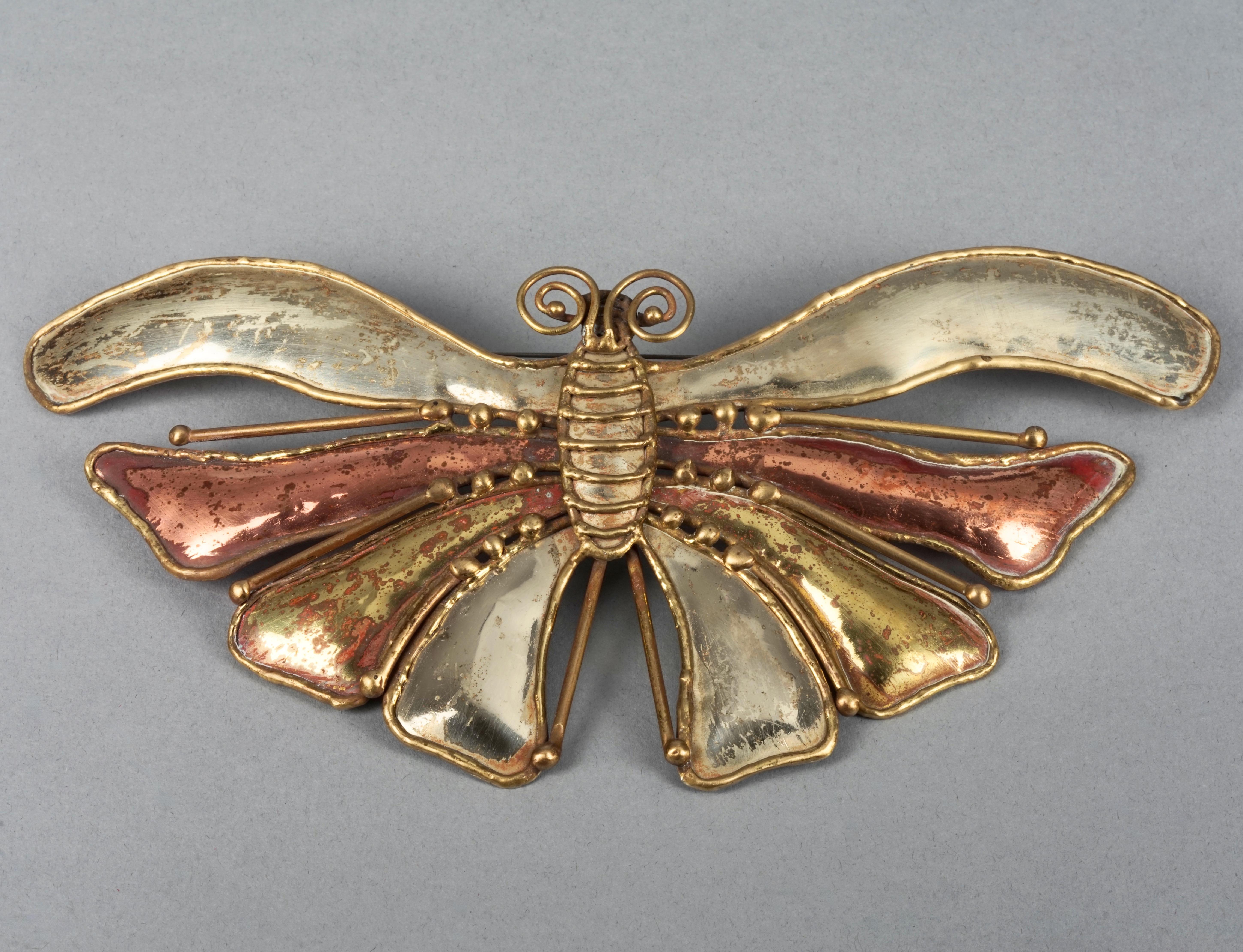 Vintage Mid Century LUCIANO BUSTAMANTE Mexico Butterfly Brutalist Brooch 

Measurements:
Height: 4.25 inches (10.8 cm)
Width: 9.05 inches (23 cm)

Features:
- 100% Authentic LUCIANO BUSTAMANTE (Mexico), Mid Century era.
- Massive brutalist butterfly