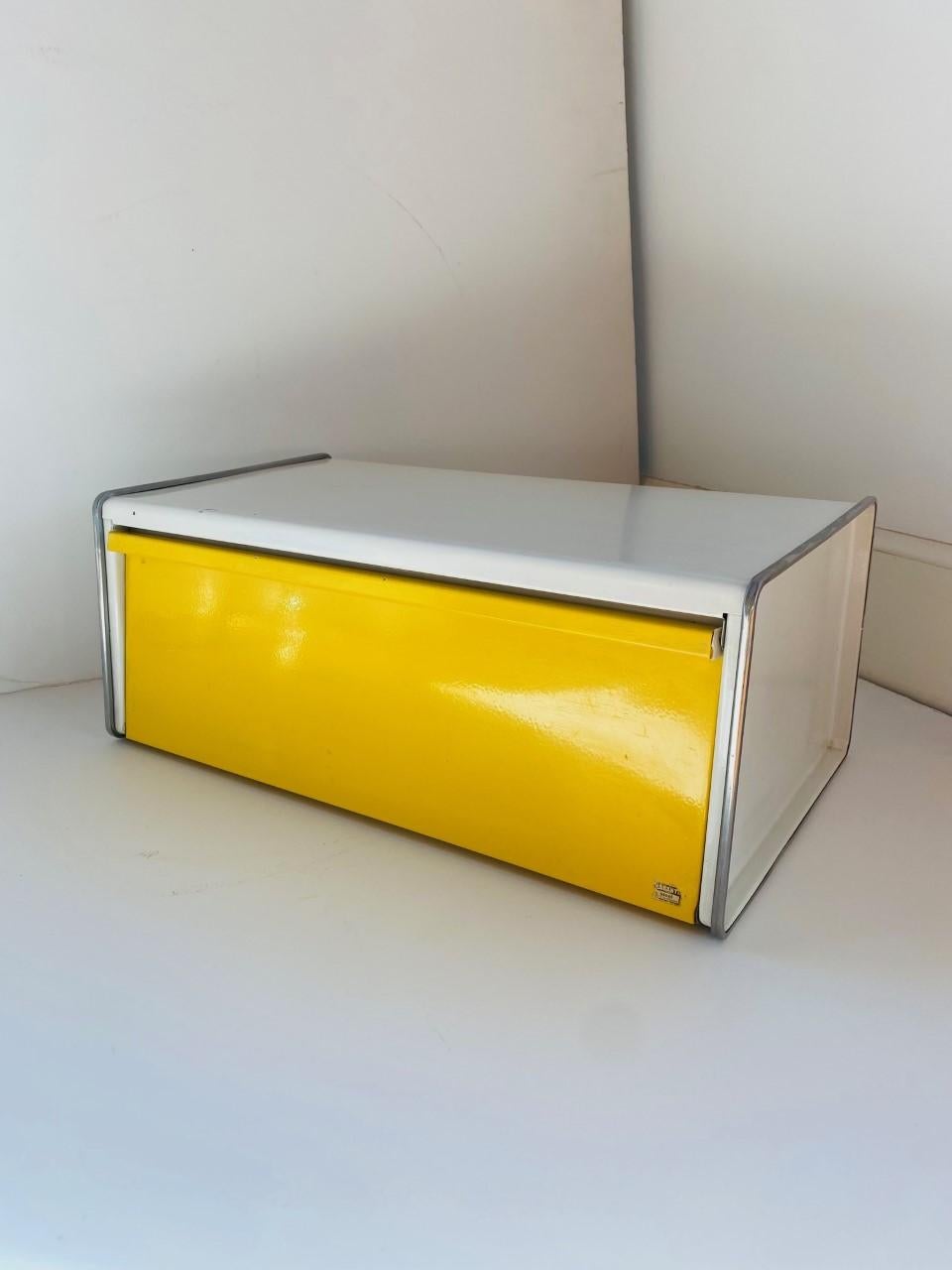 Vintage Brabantia metal bread box, white bread bin with a yellow lid., midcentury design from Holland from the 1970s. This bread box will be a real icon for your retro kitchen or décor or a very genius storage option. Groovy, light and