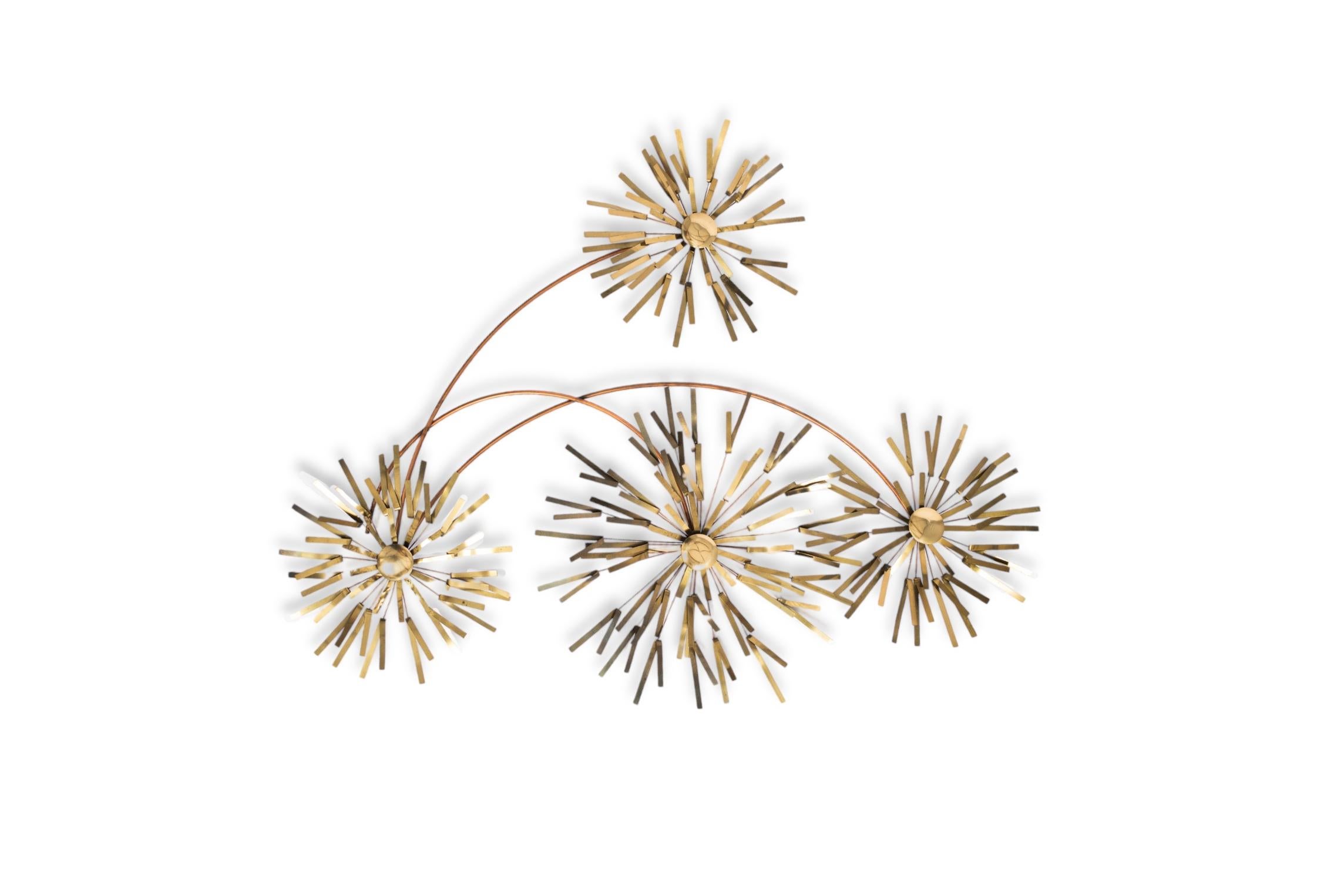 This vintage mid century modern Curtis Jere fireworks pom pom metal wall hanging features beautiful stylized round pom poms sculpted from soldered and bent brass on copper metal rods. Wall mount metal hooks are looped into the design on back. Can be