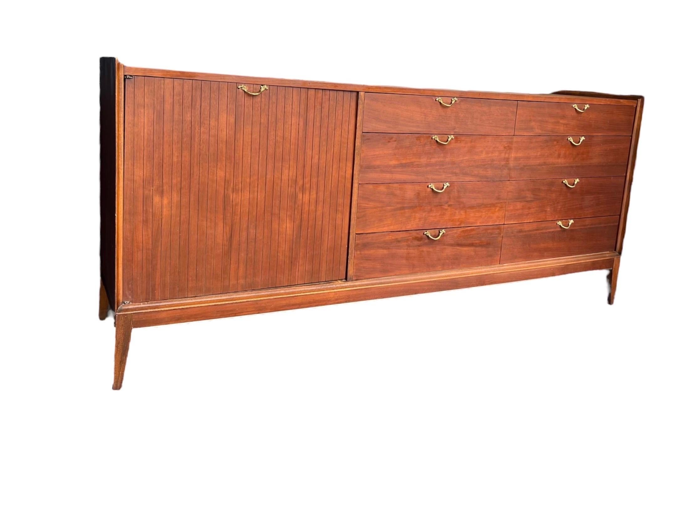 Vintage Mid-Century Modern 12 drawer dresser dovetail drawers

Dimensions. 72 W ; 18 D ; 32.5 H.
