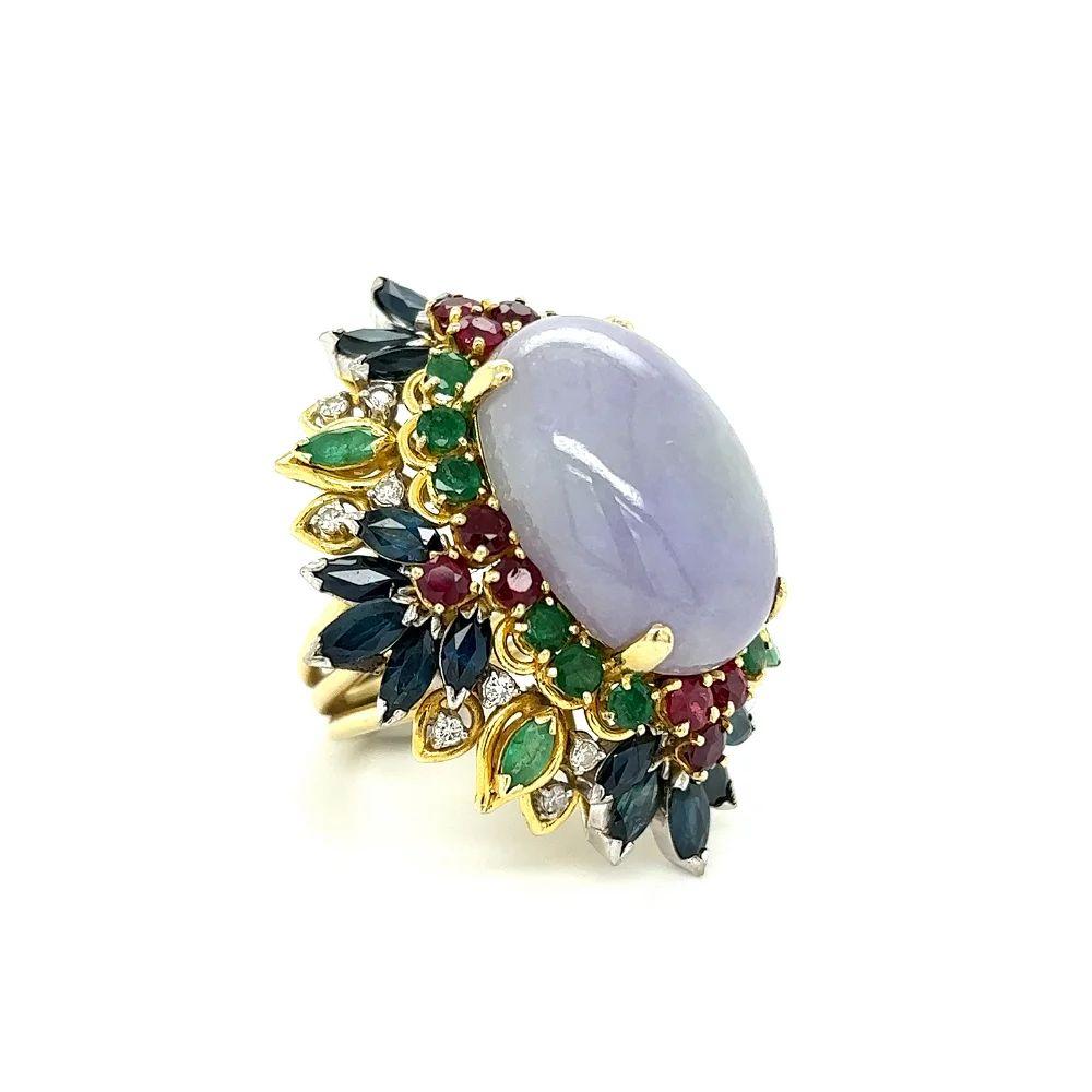 Simply Beautiful! Finely detailed Vintage Mid Century Modern Lavender Jade, Diamond, Ruby, Sapphire and Emerald Gold Cocktail Ring. Centering a securely nestled Hand set Awesome Oval 18 Carat Lavender Jade. Surrounded by Diamonds, weighing approx.