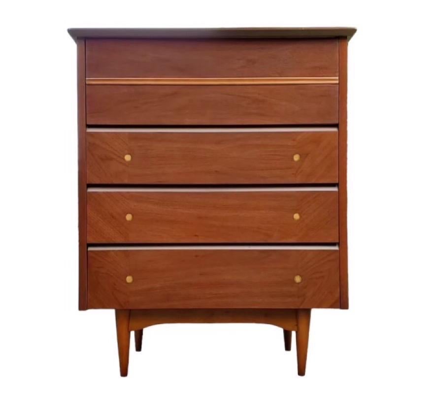 Gorgeous Mid-Century Modern lowboy dresser. Professionally refinished. Excellent and stylish piece in walnut and fruitwood that will look fantastic wherever displayed

Dimensions. 34 W ; 18 D ; 42 H