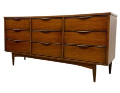 Vintage Mid-Century Modern 9-Drawer Lowboy Dresser with Sculpted Drawer Pulls.