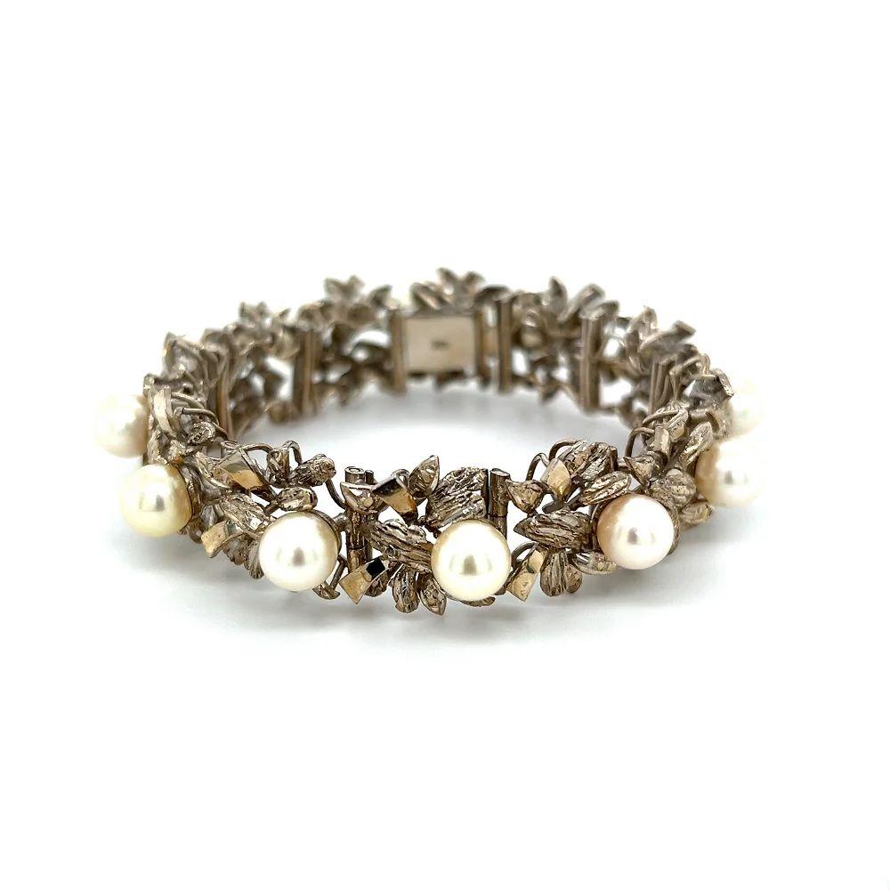 Simply Beautiful! Vintage Akoya Pearl Gold Bracelet. Hand set with 12 Akoya Pearls, each measuring 6.75mm. Bracelet Hand crafted in 14K White Gold, measuring approx. 6