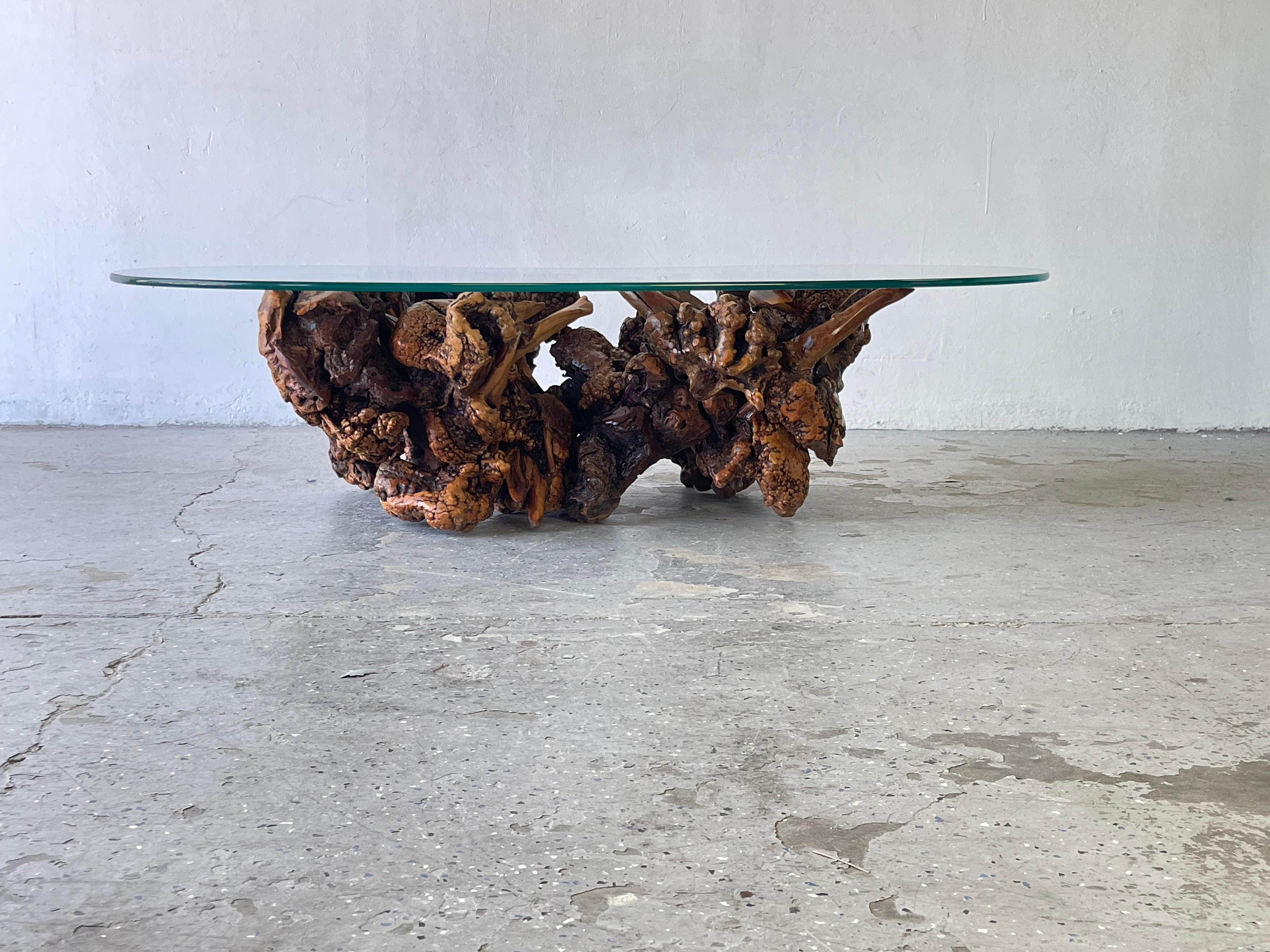 Vintage Mid-Century Modern amorphous/biomorphic glass driftwood coffee table.

Offered is a Vintage Mid Century Modern amorphous/biomorphic glass driftwood coffee table. The lines of the driftwood flowing base and design are what make this table