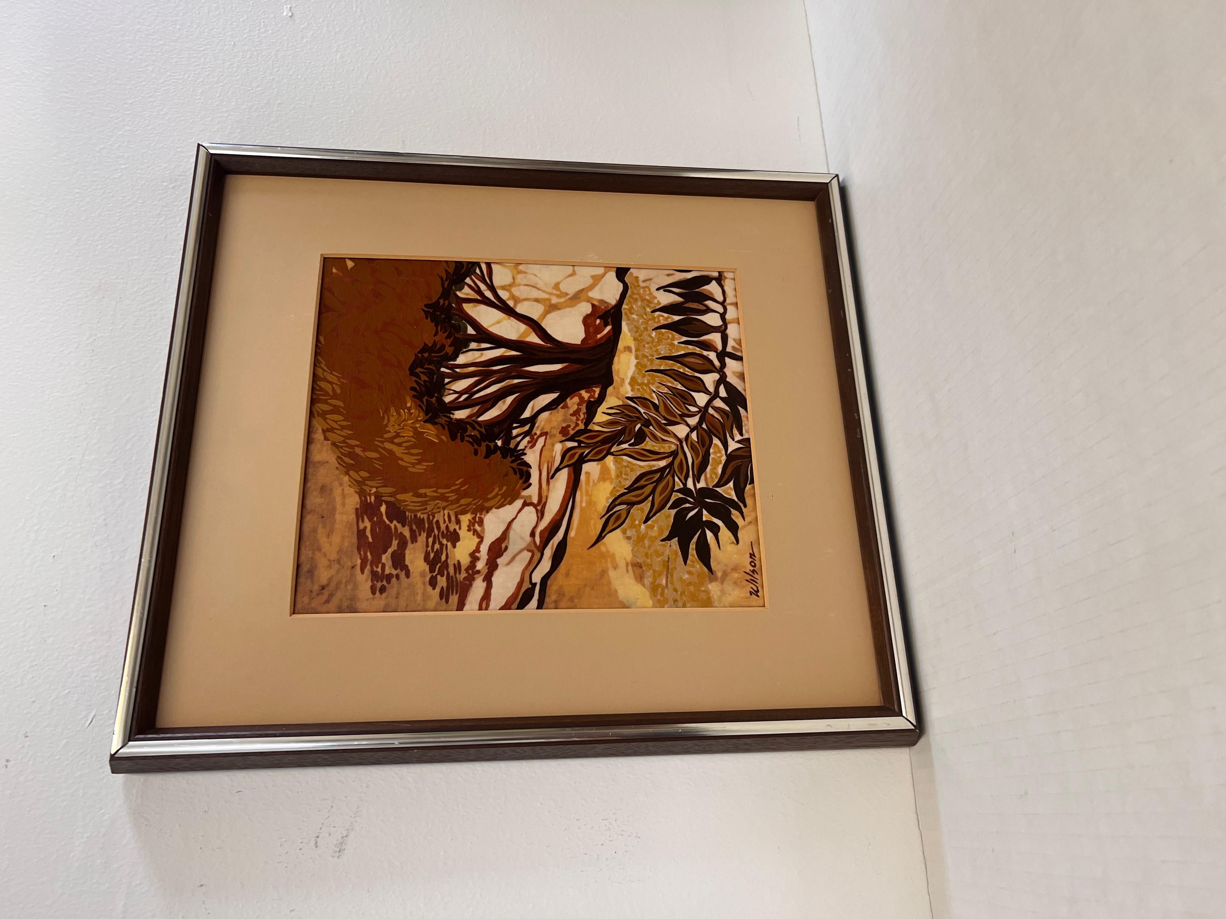 El cuadro abstracto vintage de estilo batik moderno de mediados de siglo presenta una escena paisajística caracterizada por tonos terrosos de marrones y cremas. La obra de arte muestra un árbol estilizado con ramas y hojas intrincadas, lo que añade