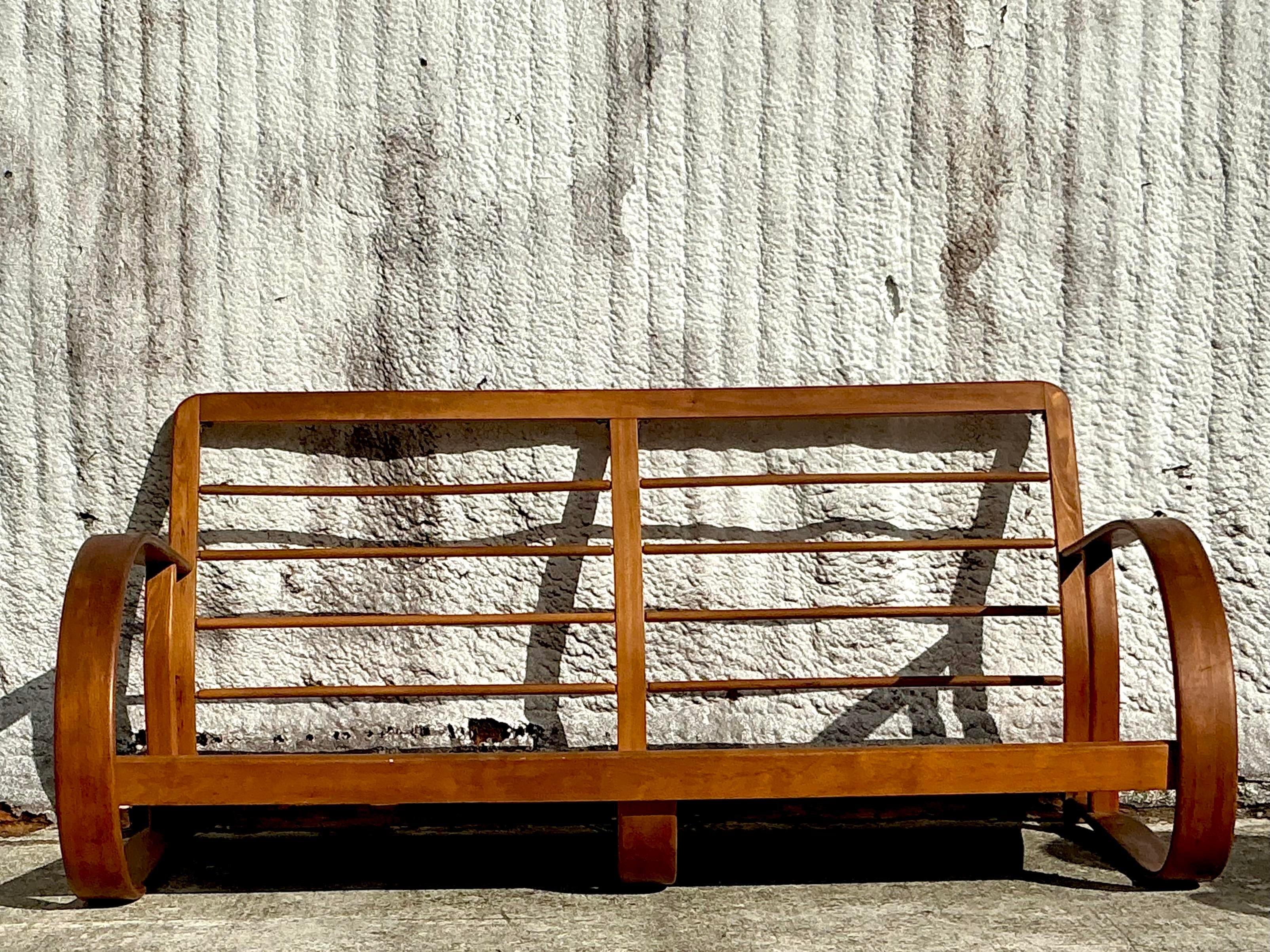 Bois Canapé vintage moderne du milieu du siècle dernier en bois courbé d'après Gilbert Rohde en vente