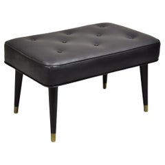 Vintage Mid Century Modern Black Tufted Vinyl Tapered Leg Footstool Ottoman
