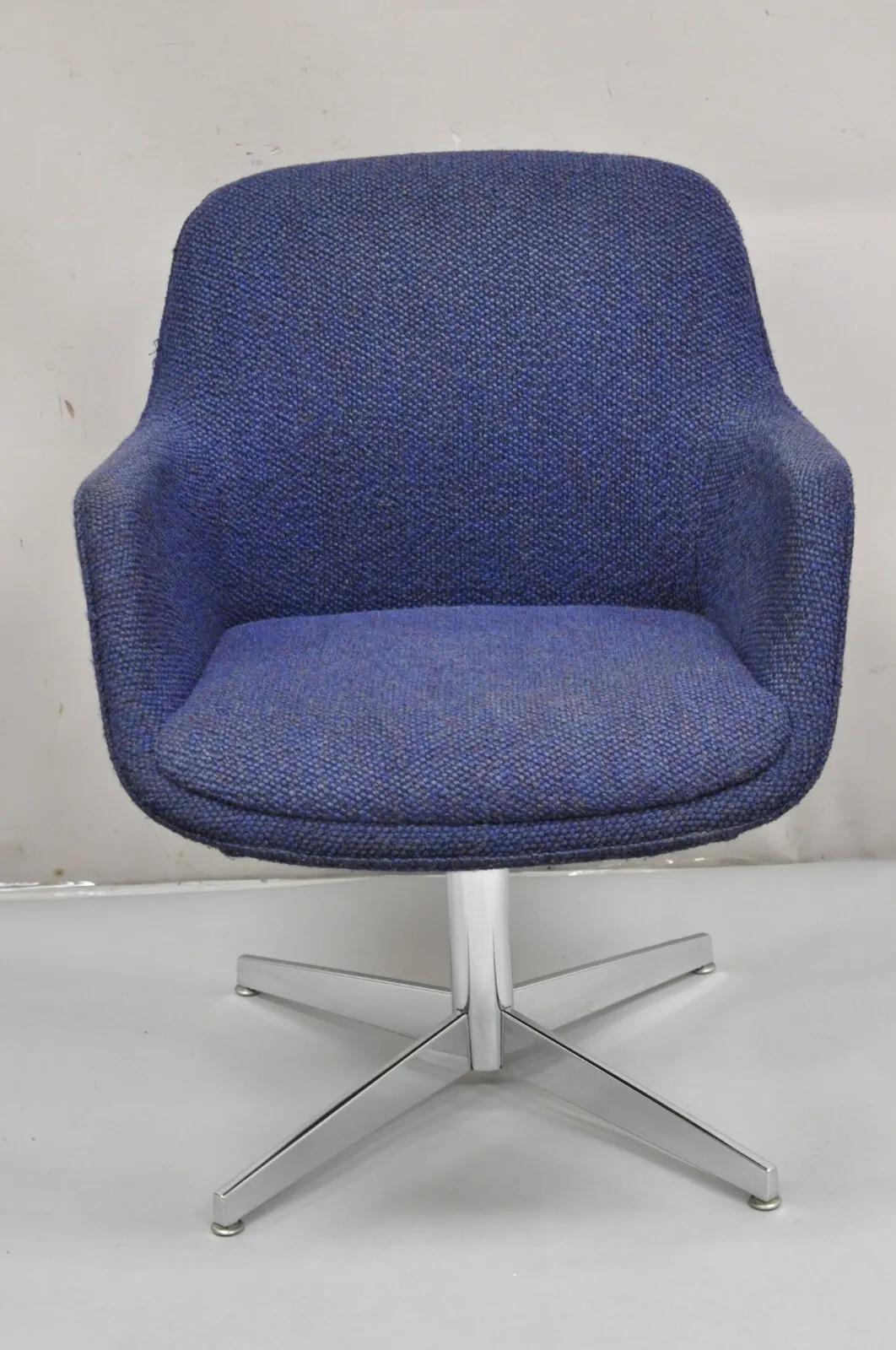 Vintage Mid Century Modern Blue Upholstered Chrome Swivel Base Club Arm Chair. Item features blue knubby wool upholstery, chrome swivel base, clean Modernist lines, very nice vintage item. Circa  Late 20th Century. Measurements: 32