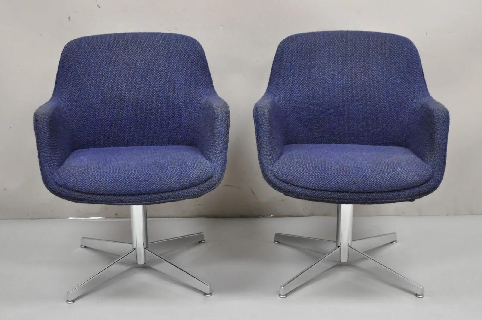 Vintage Mid Century Modern Blue Upholstered Chrome Swivel Base Club Chairs - a Pair. Item features blue knubby wool upholstery, chrome swivel base, clean Modernist lines, very nice vintage item. Circa Late 20th Century. Measurements: 32