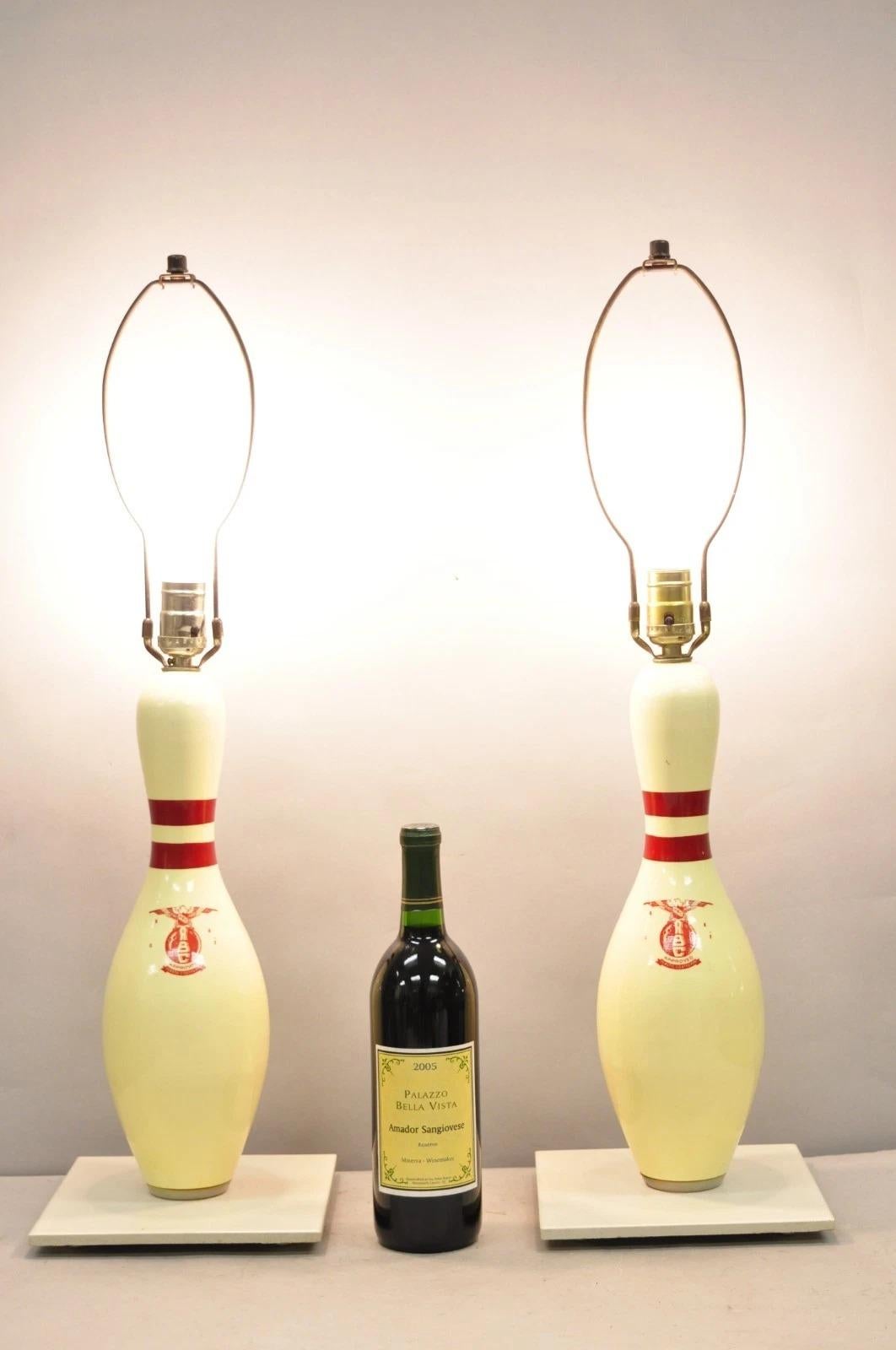Vintage Mid Century Modern Bowling Pin Man Cave Game Room Table Lamps Raised on Italian Ceramic Tile Bases - a Pair. Circa Late 20th Century. Measurements: 28