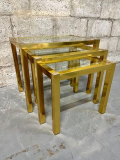 Vintage Mid Century Modern Brass Anodized Aluminum Nesting Tables. Circa 1960s