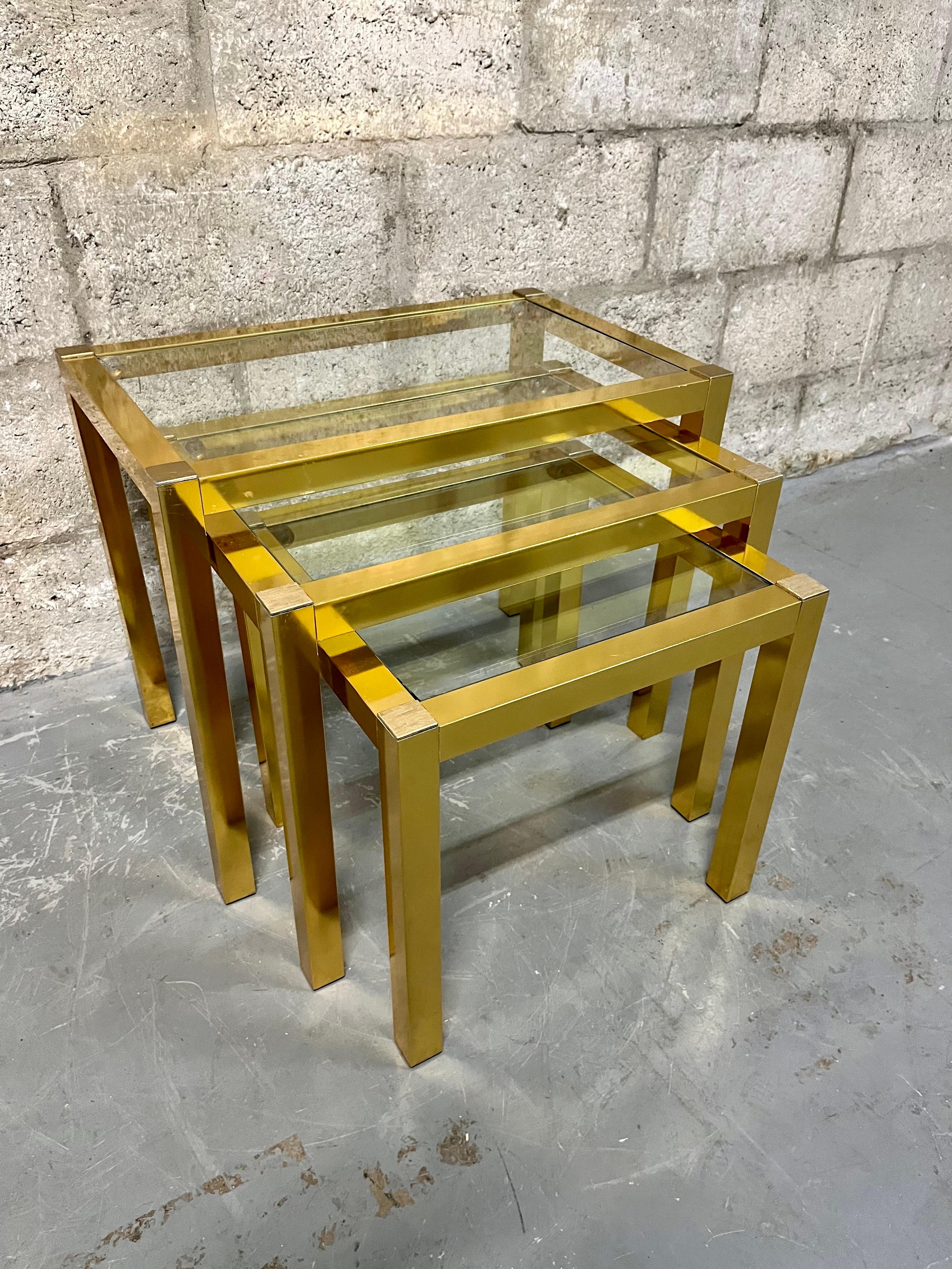 Vintage Mid Century Modern Brass Anodized Aluminum Nesting Tables. Circa 1960s  In Good Condition For Sale In Miami, FL