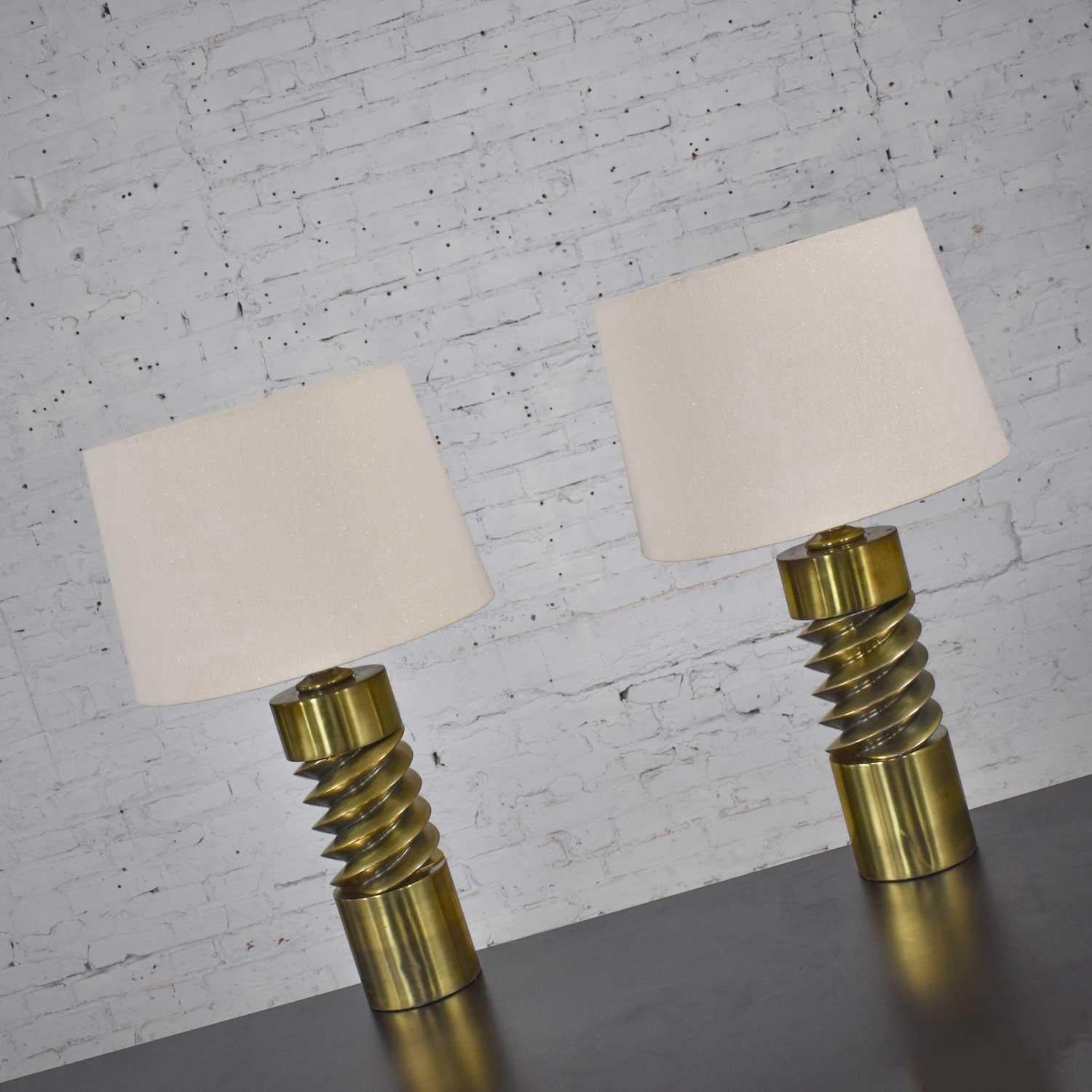 Awesome Mid-Century Modern brass plated corkscrew style table lamps with new off-white shades. Beautiful vintage condition with gorgeous patina that only time creates with age and wear. Please see photos. Circa mid century.

Come on BABY…Let’s do