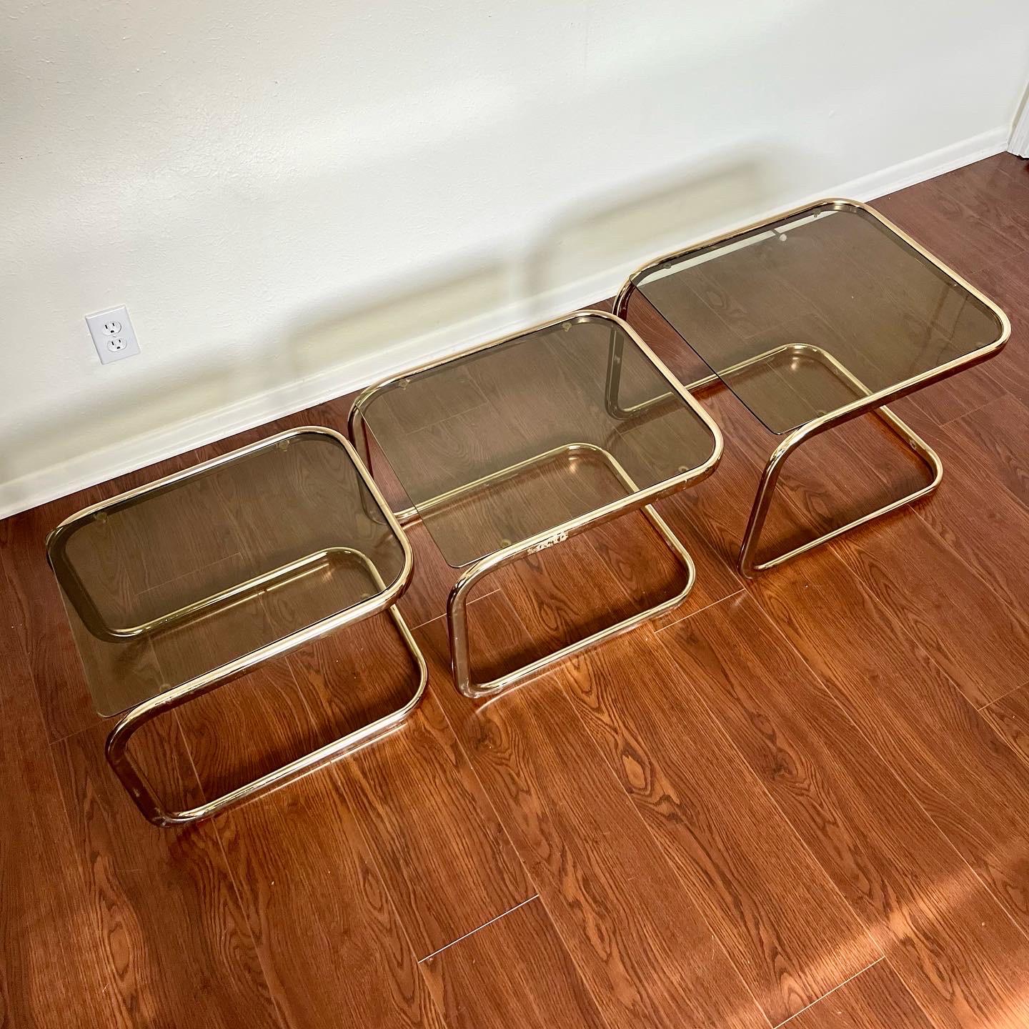 Vintage Mid-Century Modern Brass Smoked Glass Nesting Tables by Milo Baughman In Good Condition In Houston, TX